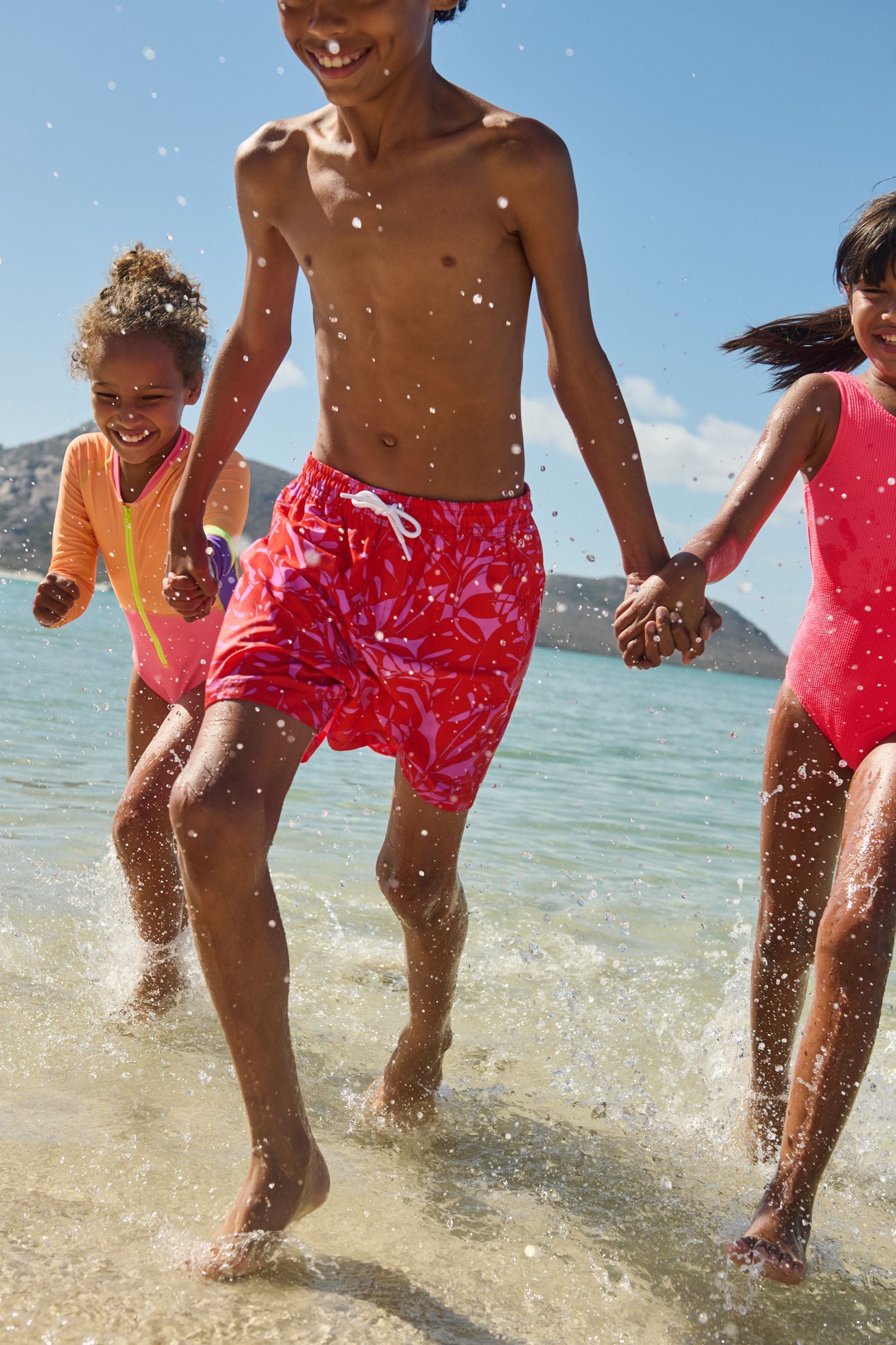 Bright Pink Leaf Printed Swim Shorts (3mths-16yrs)