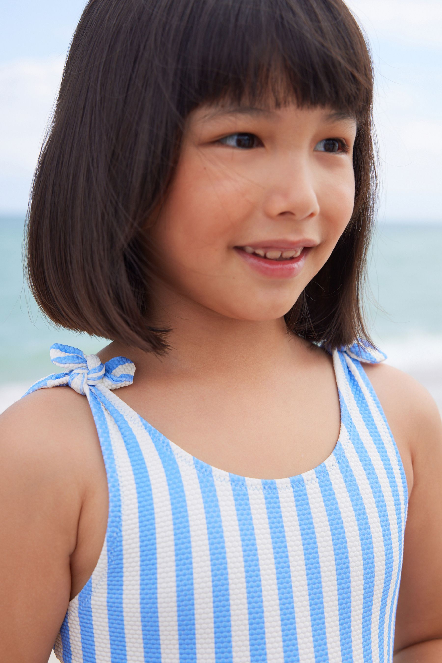 Blue/White Stripe Frill Sleeve Swimsuit (3mths-12yrs)