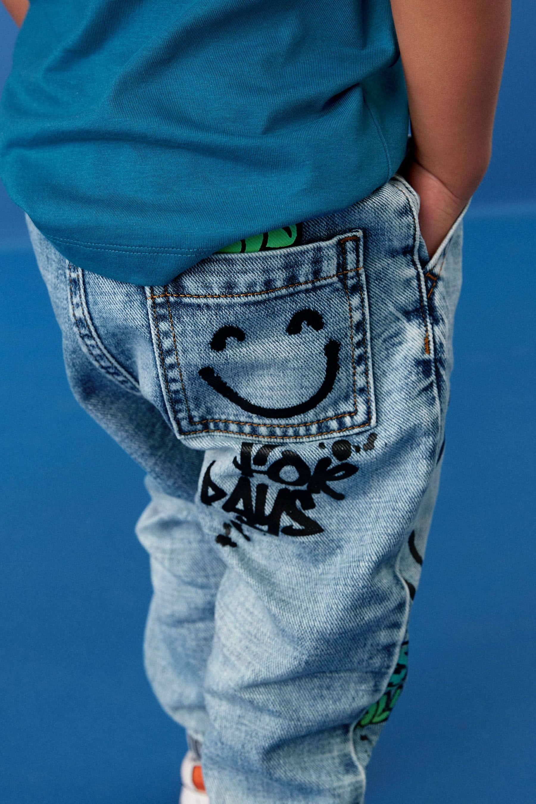 Light Blue Denim 100% Cotton Graffiti Print Jeans (3mths-7yrs)