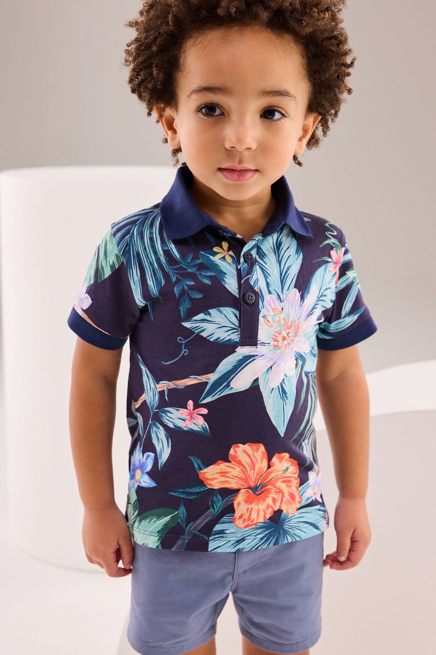 White/Blue Tropical All Over Print Short Sleeve Polo Shirt (3mths-7yrs)