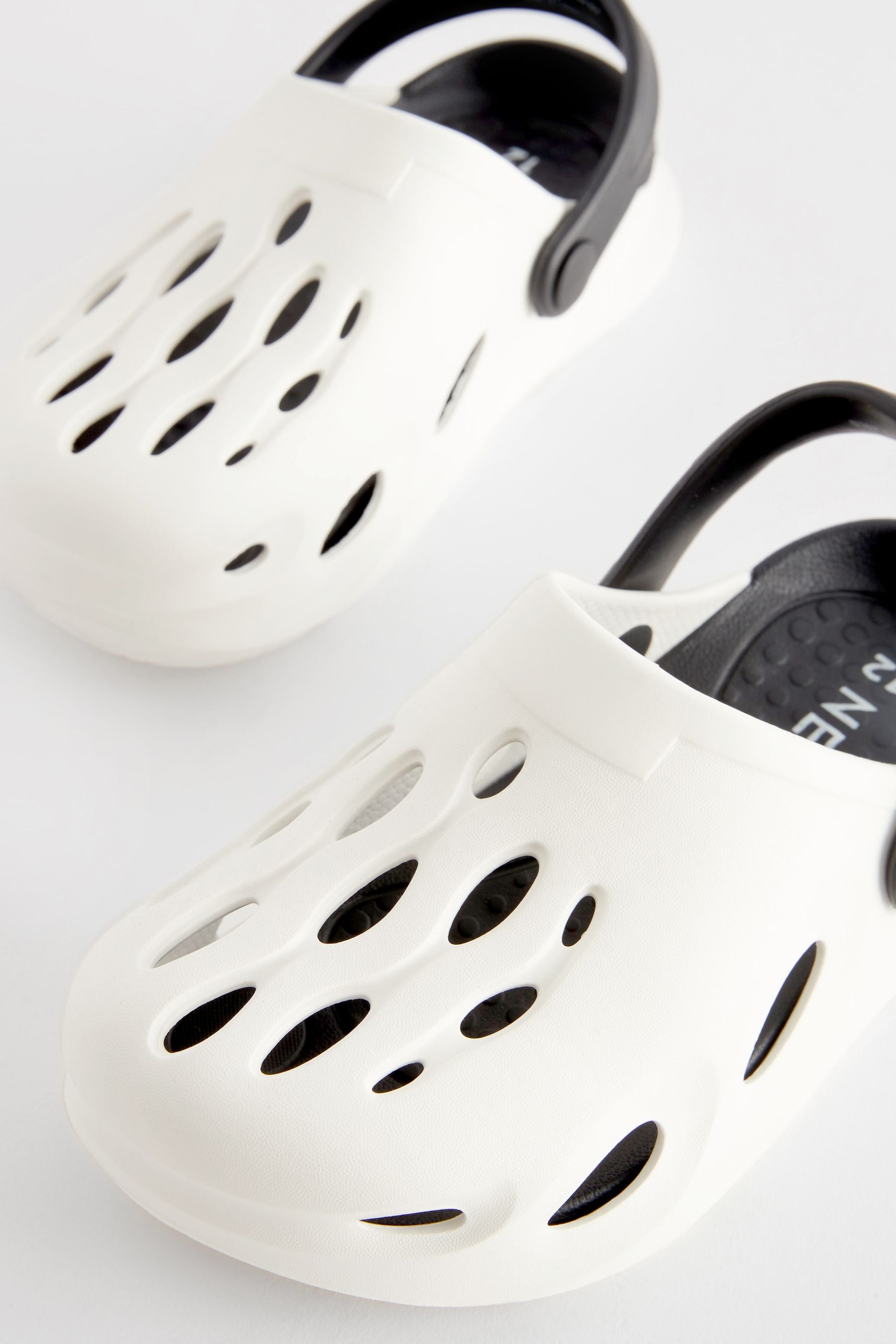 White Monochrome Clogs