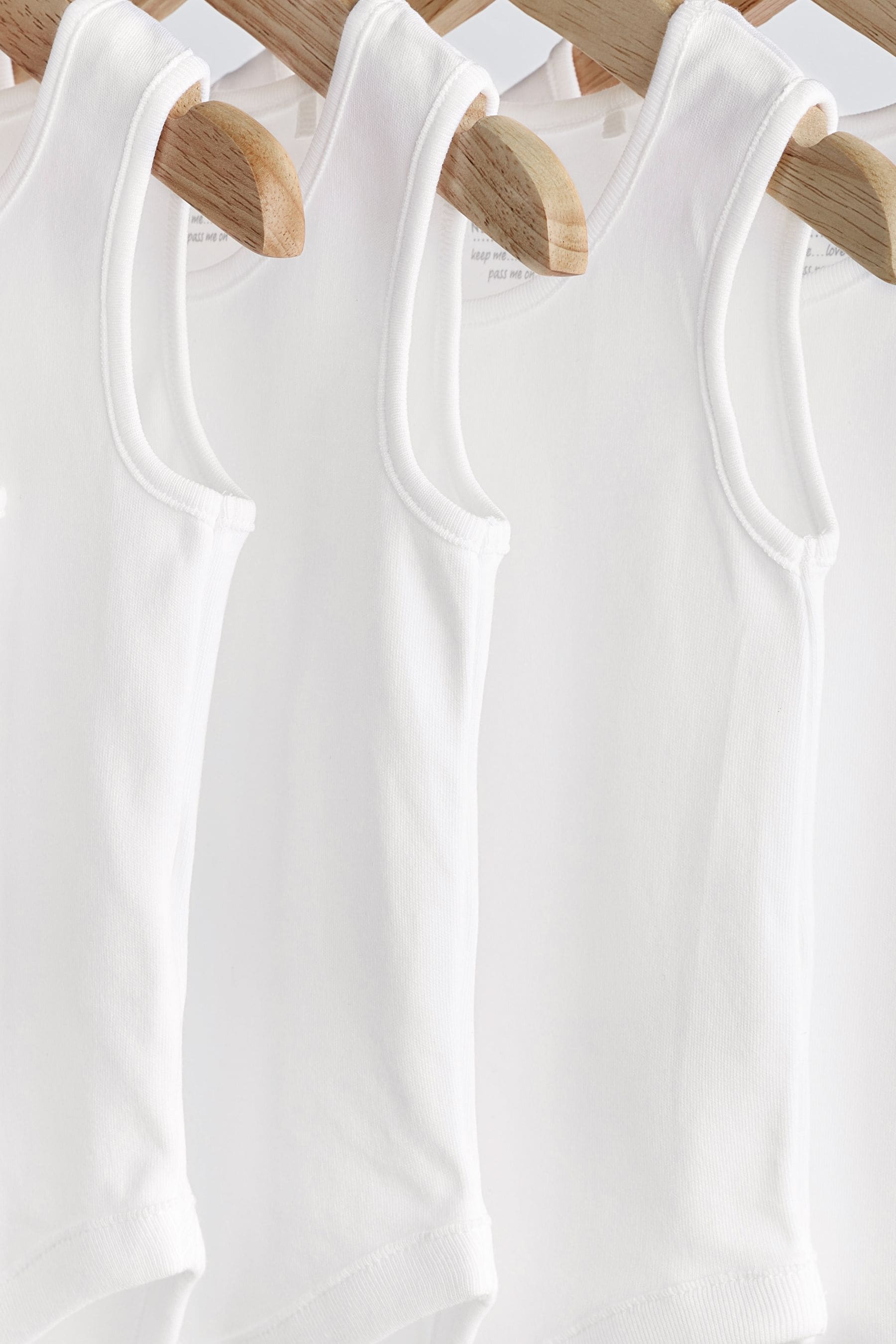 White 7 Pack Baby Vest Bodysuits