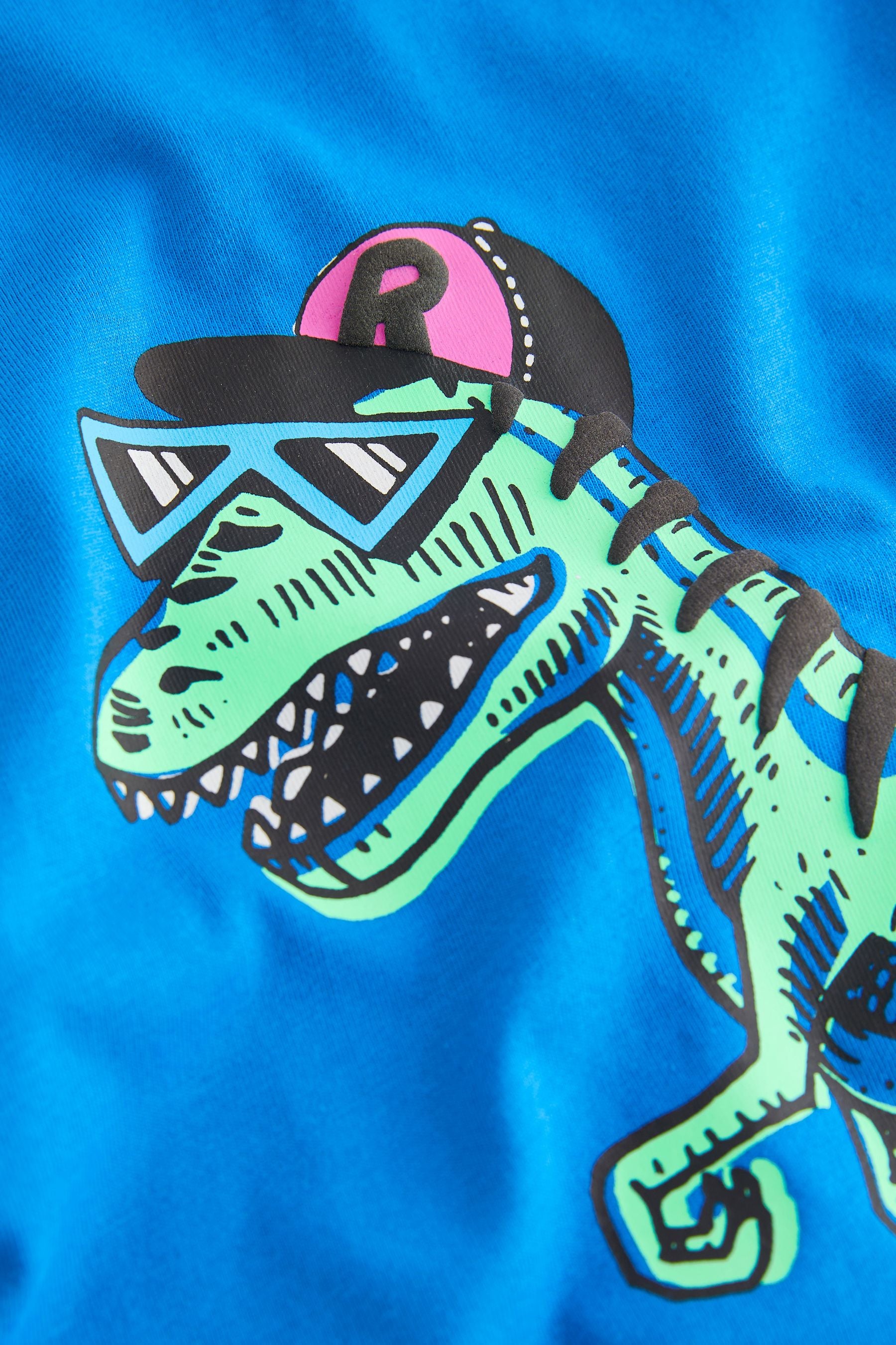 Bright Blue Skating Dino Relaxed Fit Short Sleeve Graphic 100% Cotton T-Shirt (3-16yrs)