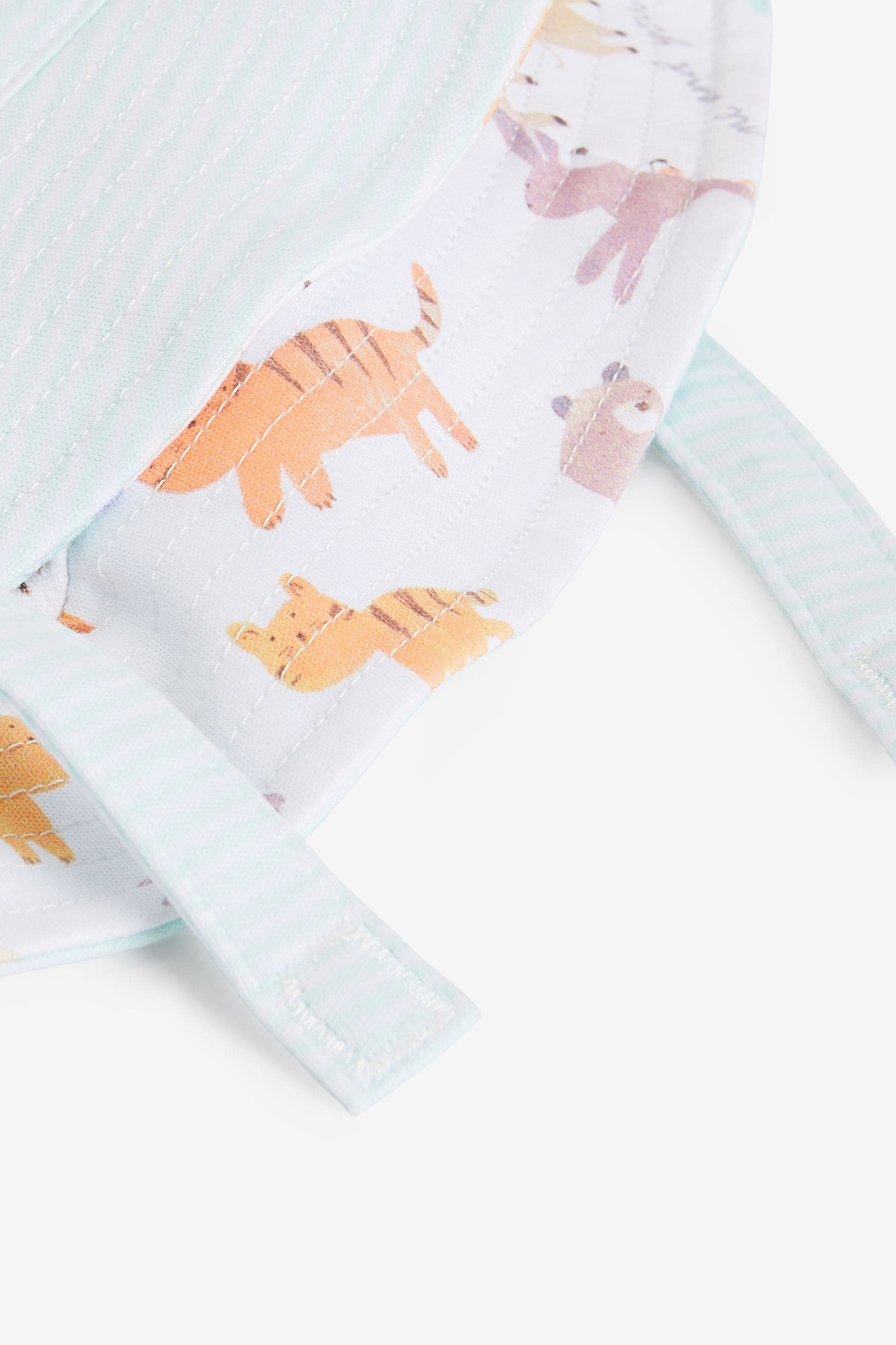 White Reversible Noahs Ark Print Baby Bucket Hat (0mths-2yrs)