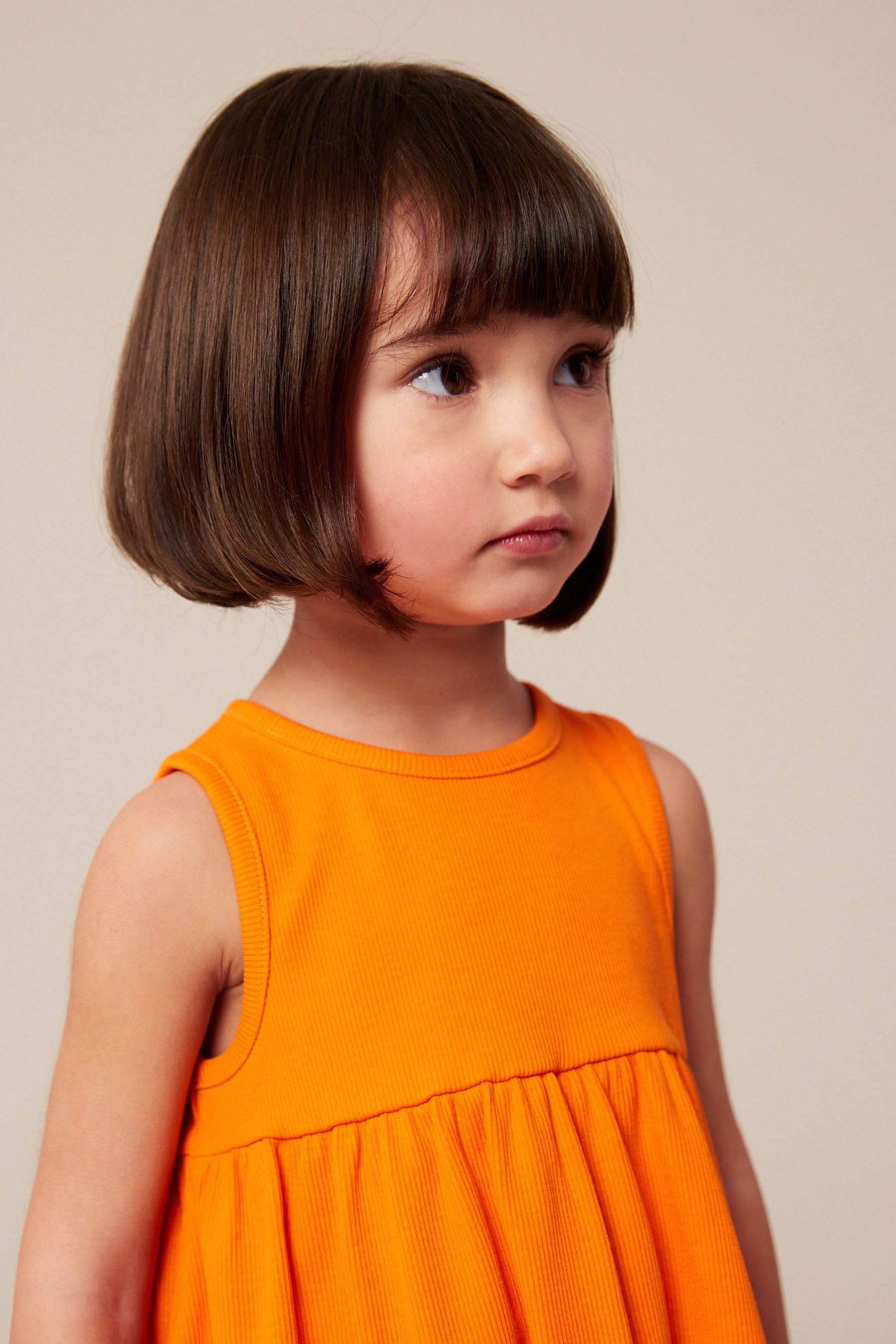 Orange Peplum Ribbed Vest (3mths-7yrs)