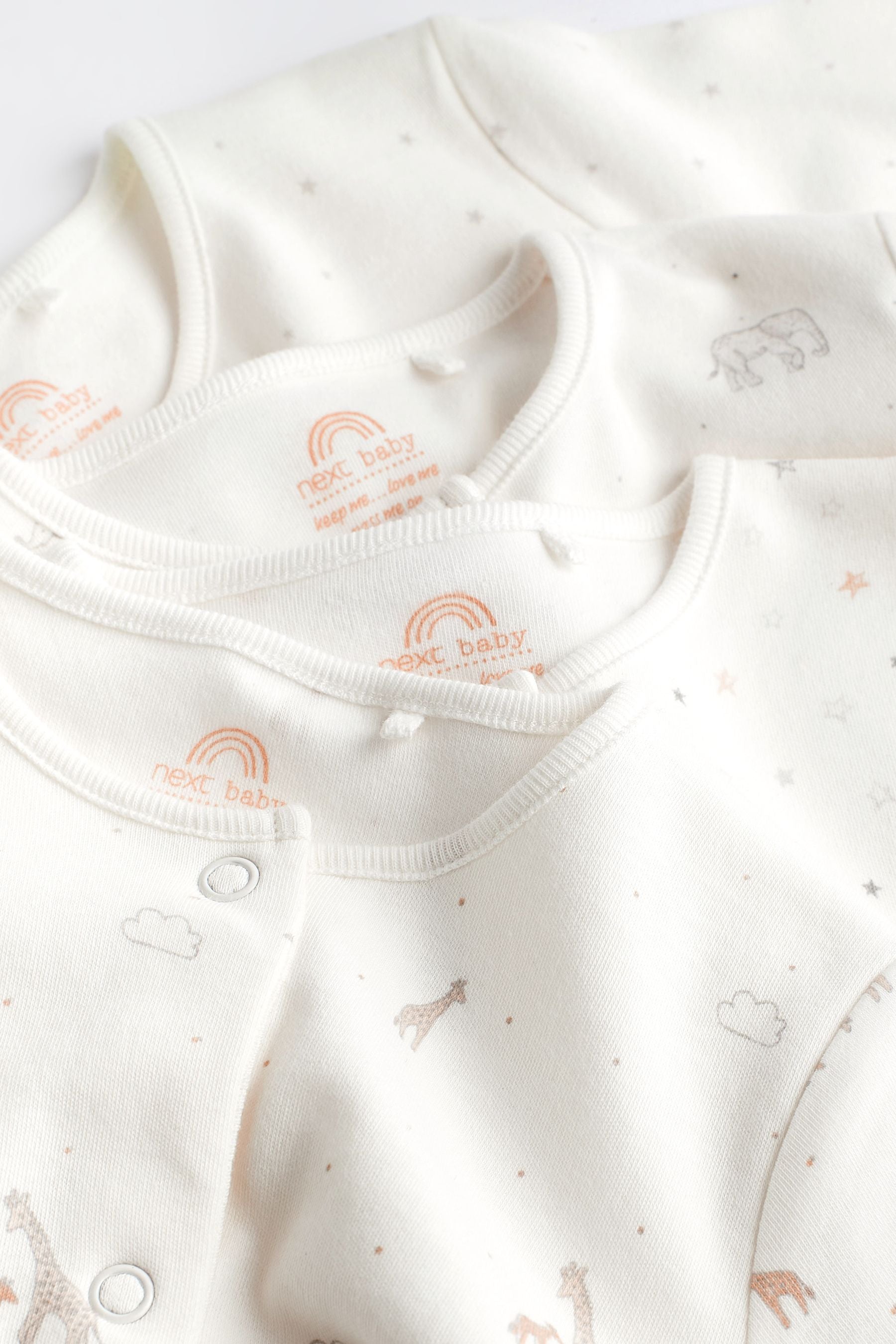 Delicate White Animal 4 Pack Baby Printed Long Sleeve Sleepsuits (0-2yrs)