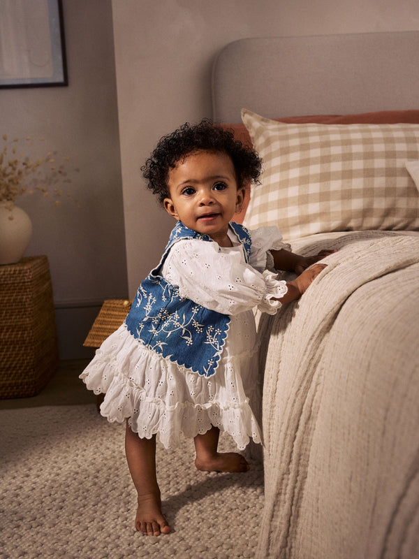 White 100% Cotton Woven Baby Broderie Dress And Denim Waistcoat Set (0mths-2yrs)