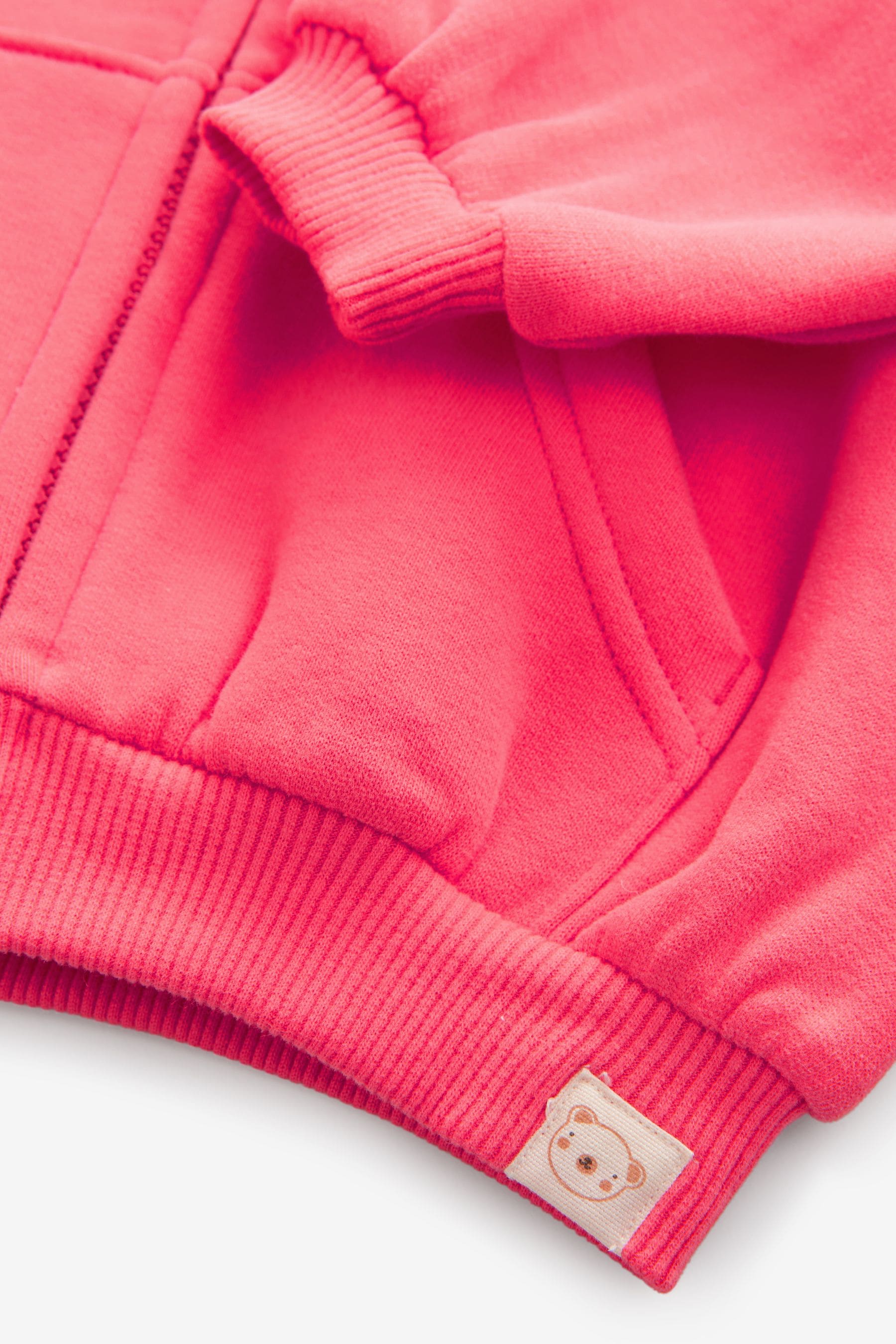 Coral Pink Zip Through Hoodie (3mths-7yrs)