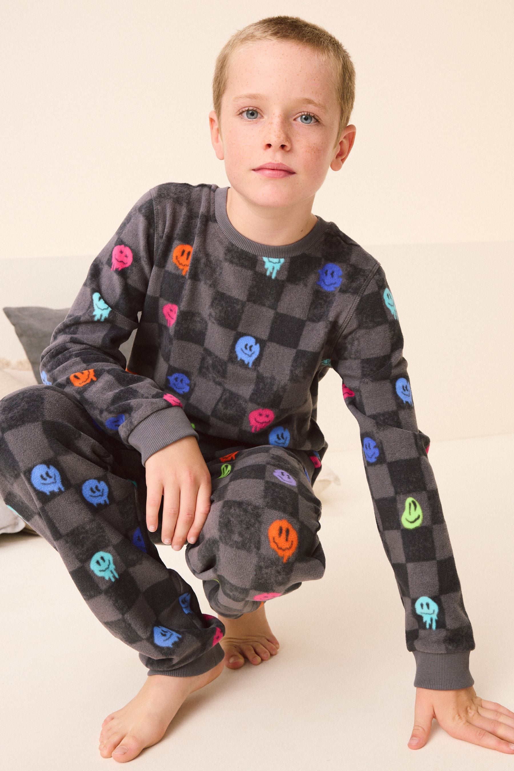 Black/White Checkerboard Smiley Face Single Soft Touch Fleece With Elastane (3-16yrs)