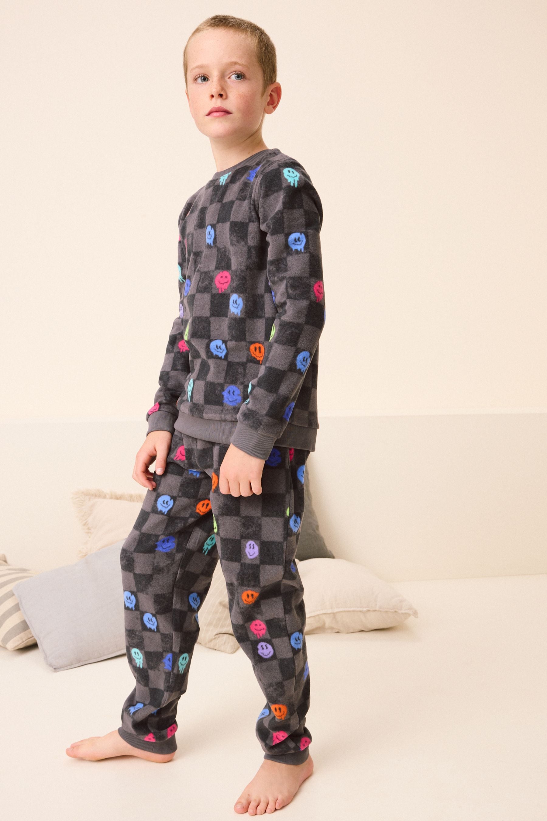 Black/White Checkerboard Smiley Face Single Soft Touch Fleece With Elastane (3-16yrs)