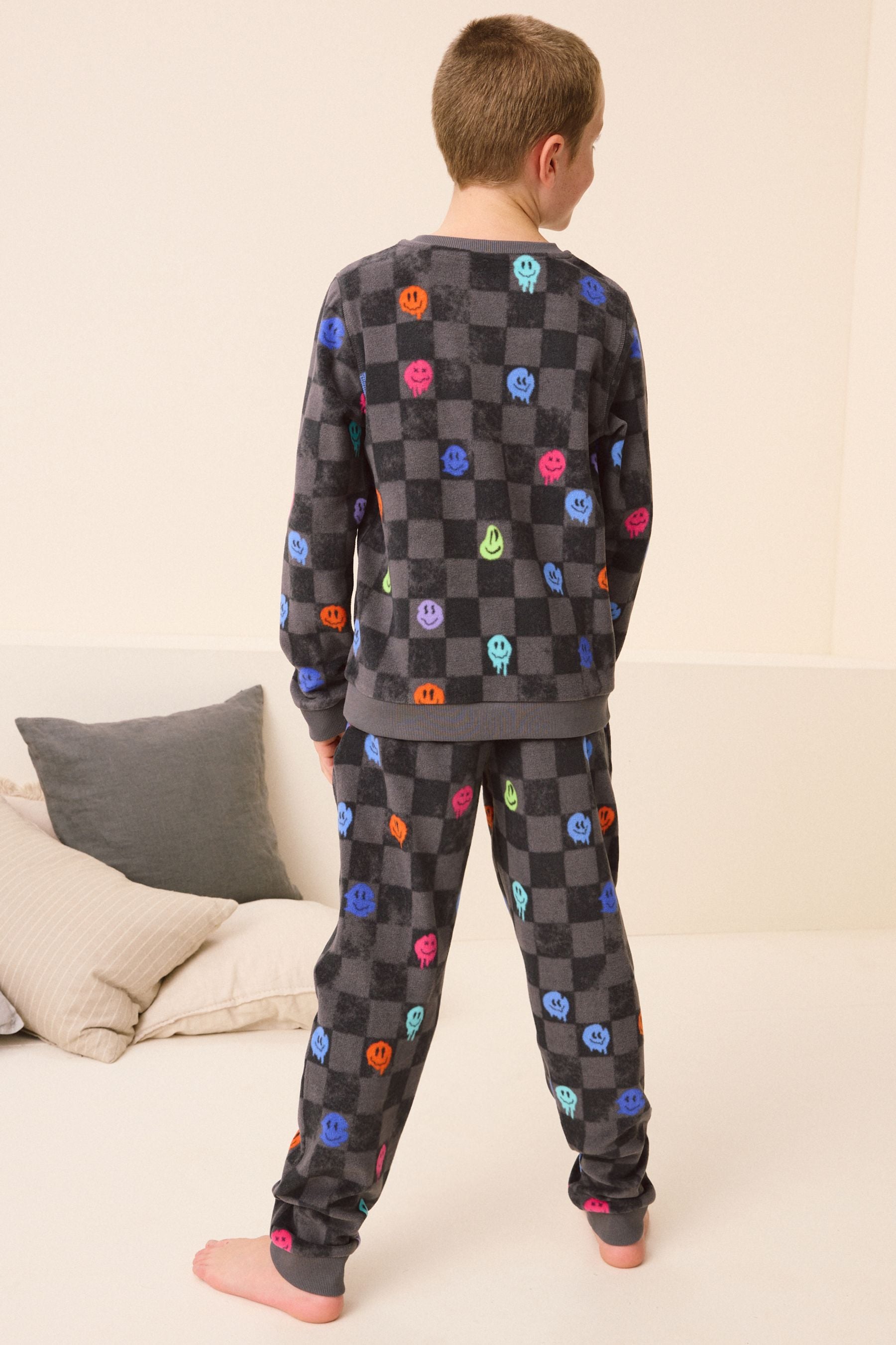 Black/White Checkerboard Smiley Face Single Soft Touch Fleece With Elastane (3-16yrs)