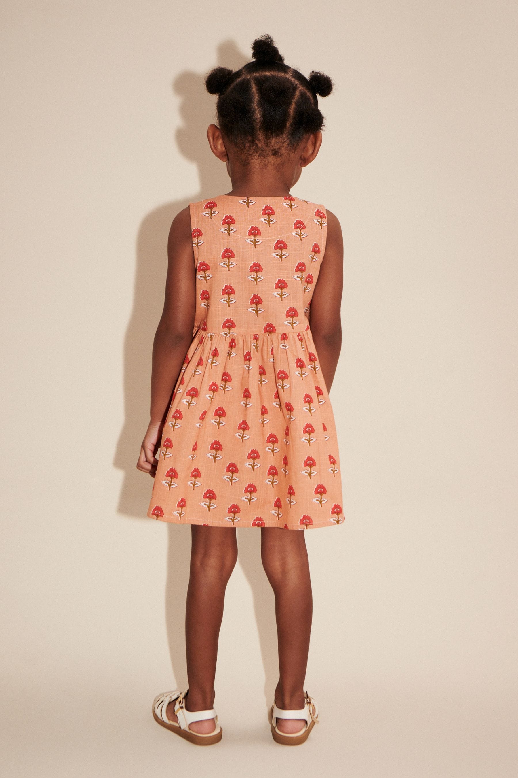 Soft Orange Woodblock Peplum Dress (3mths-8yrs)