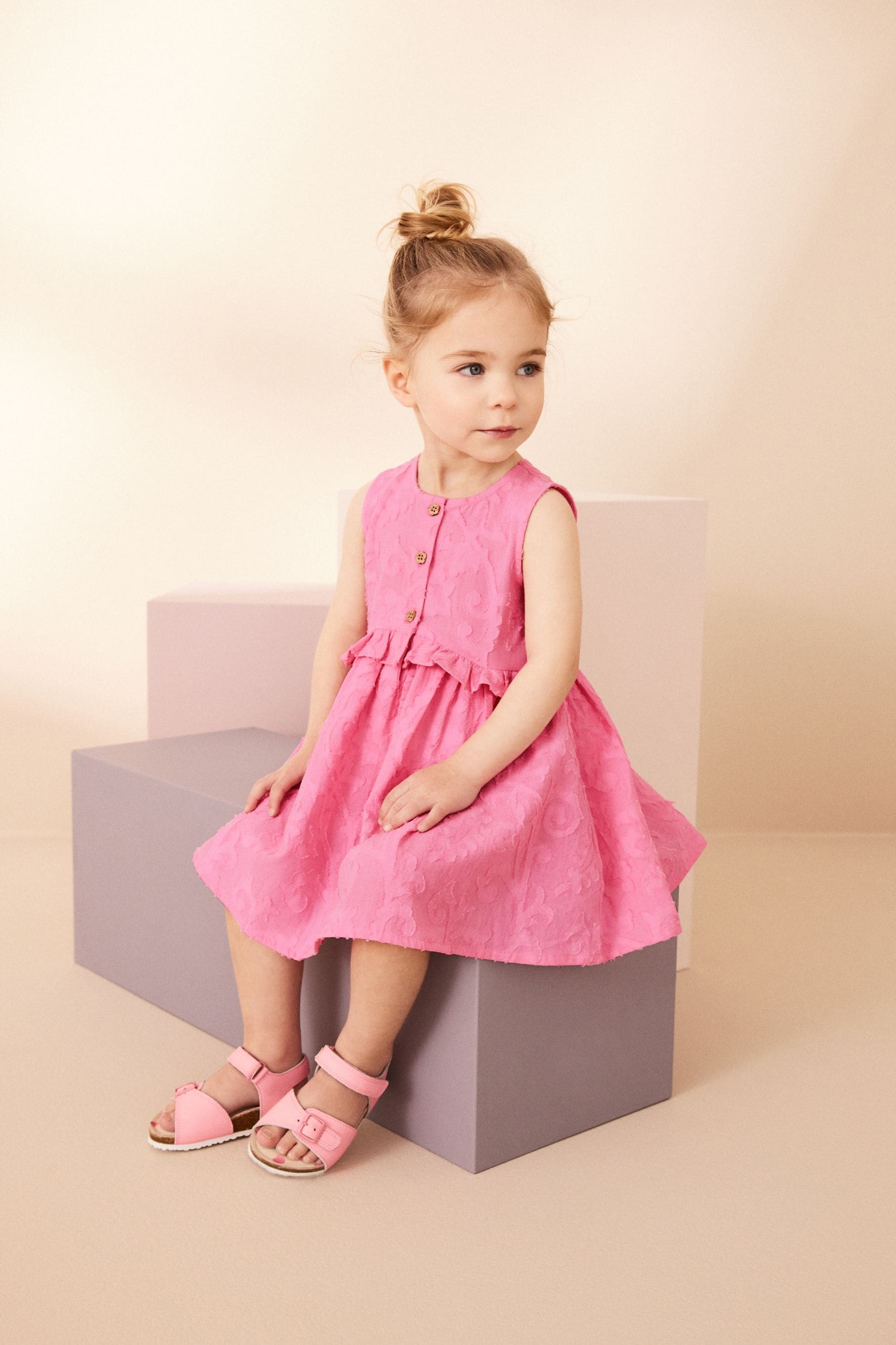 Pink Textured Peplum Dress (3mths-8yrs)