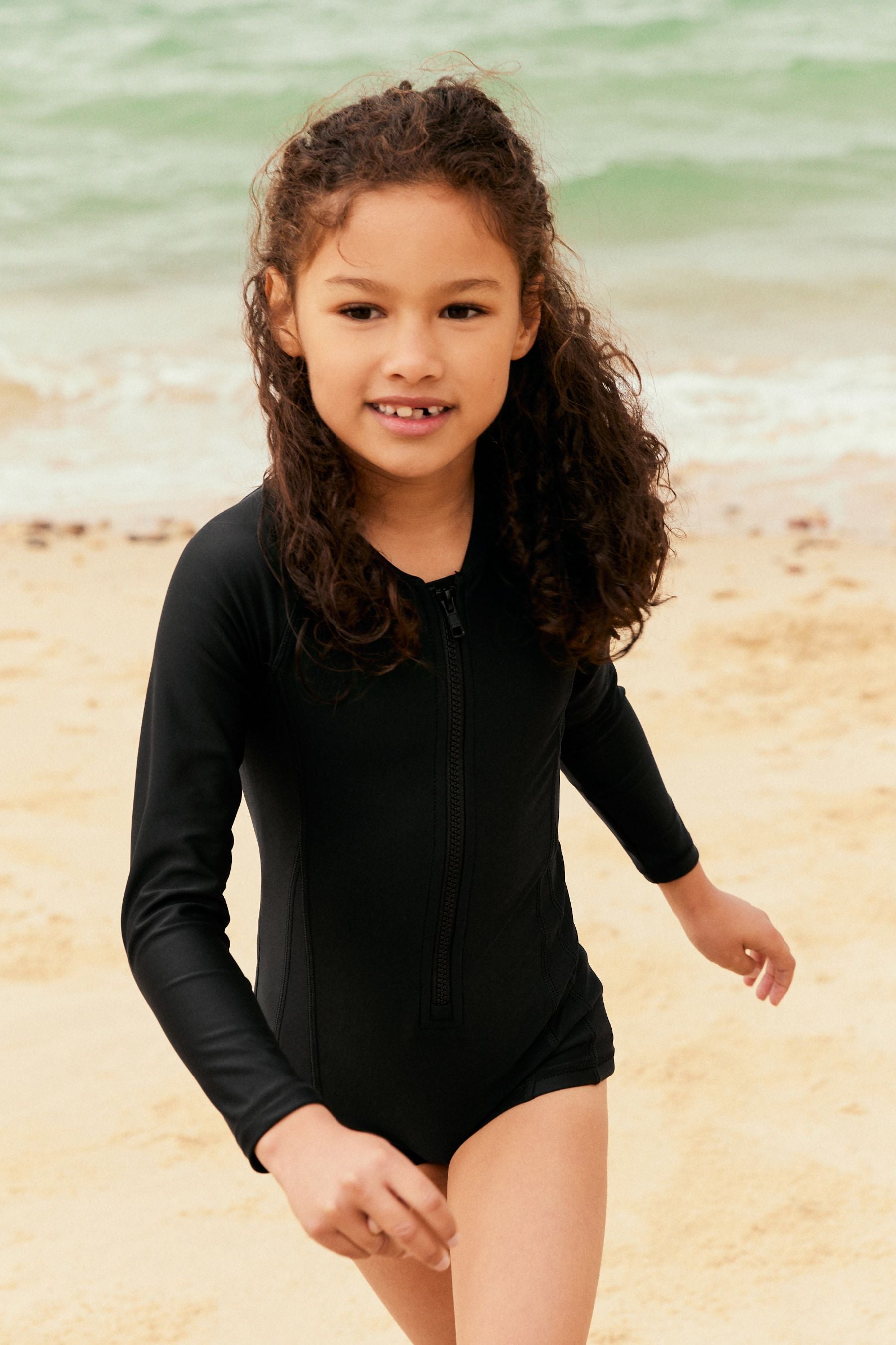 Black Long Sleeved Shortie Swimsuit (3-16yrs)