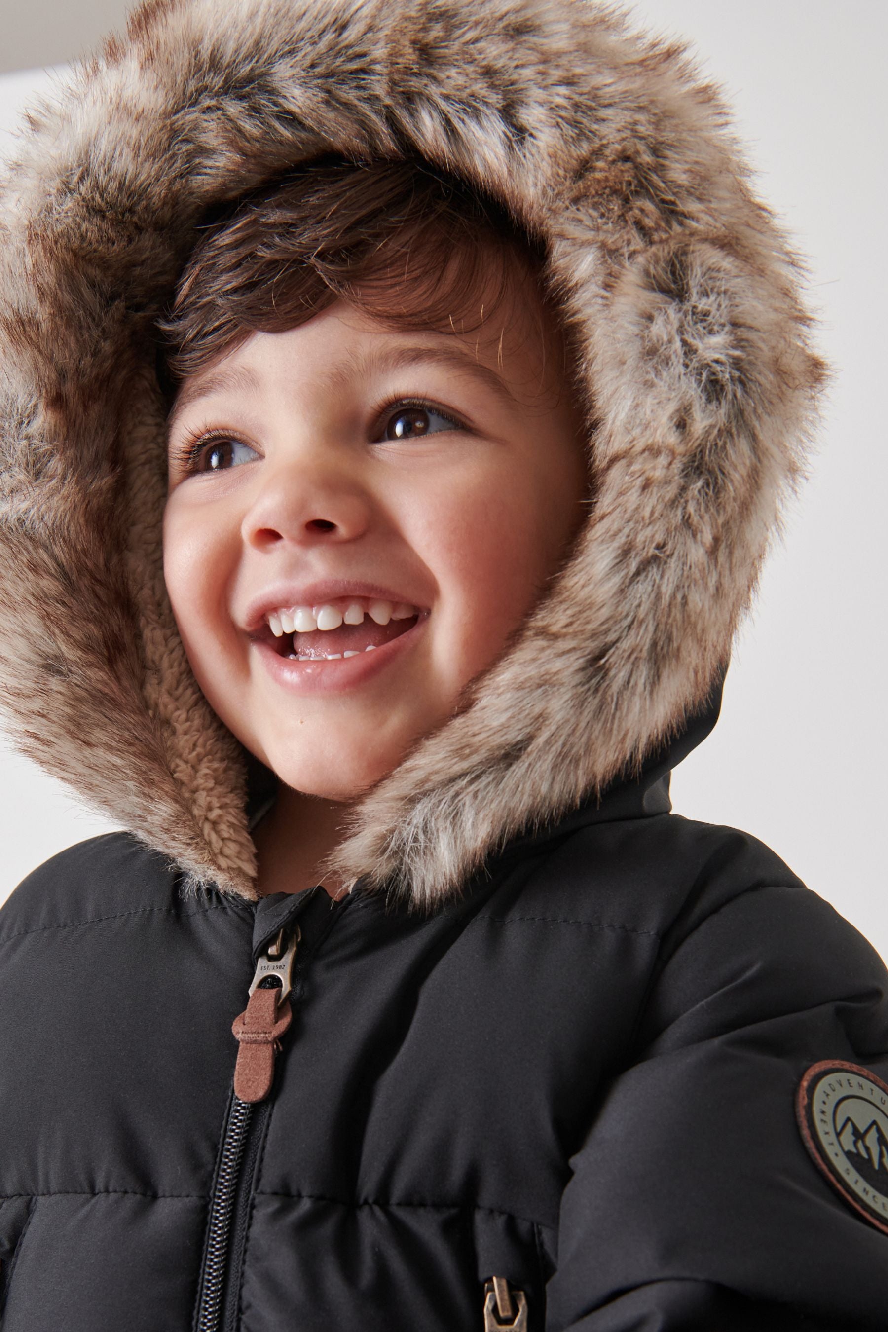 Black Snowsuit With Faux Fur Hood Trim (3mths-7yrs)