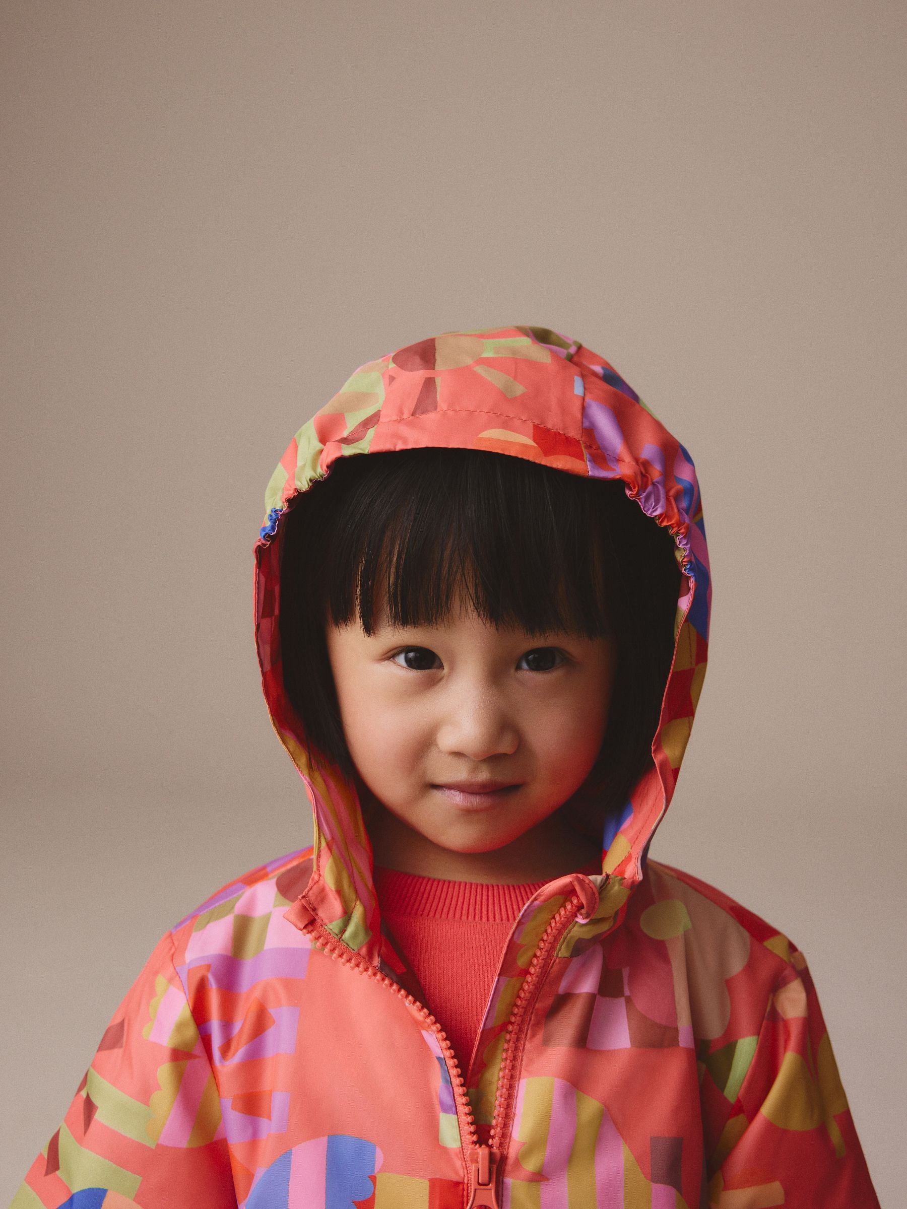 Multi Bright Shower Resistant Printed Cagoule Jacket (3mths-7yrs)