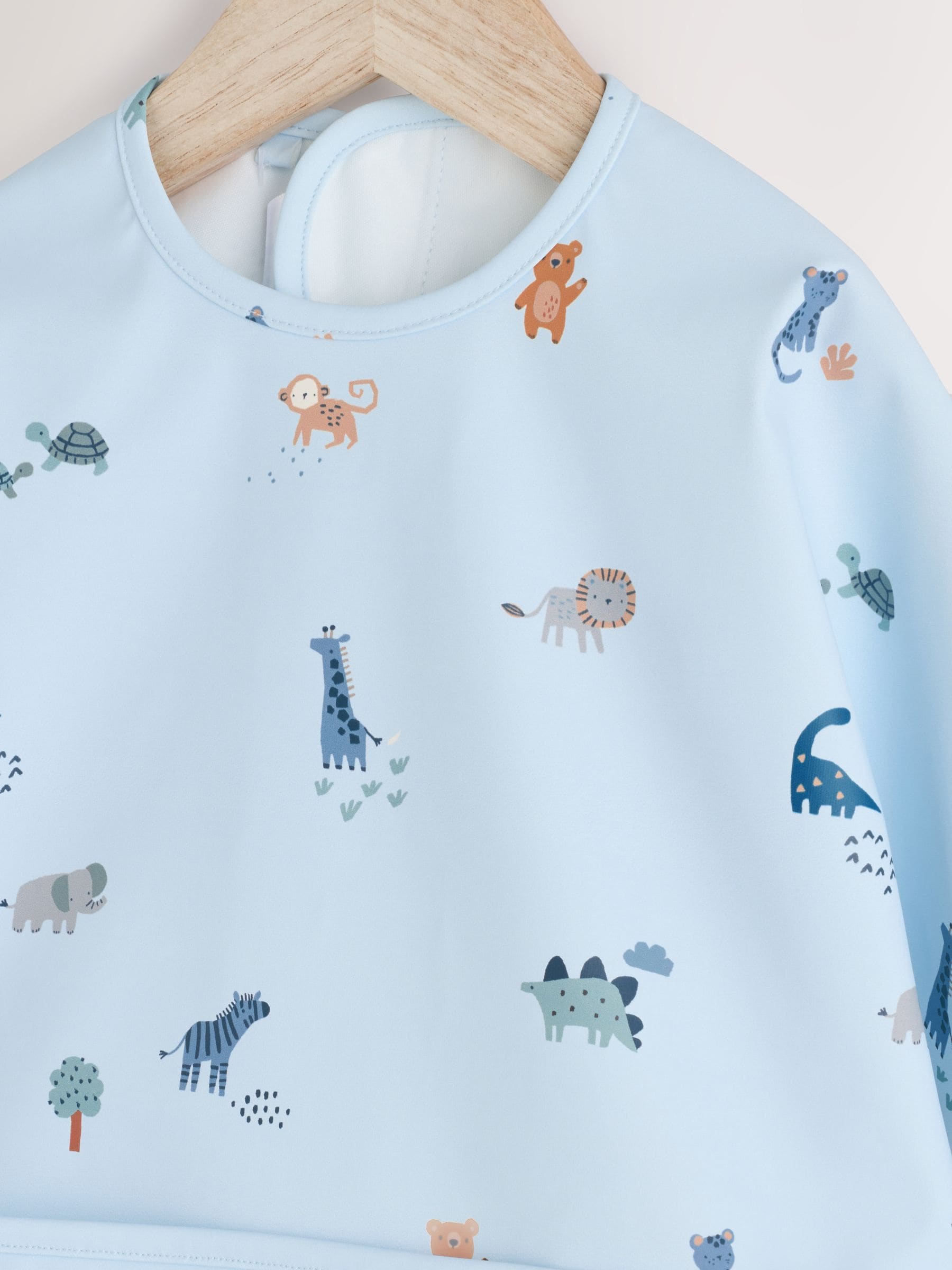 Blue Dino Jungle Baby Weaning And Feeding Sleeved Bib