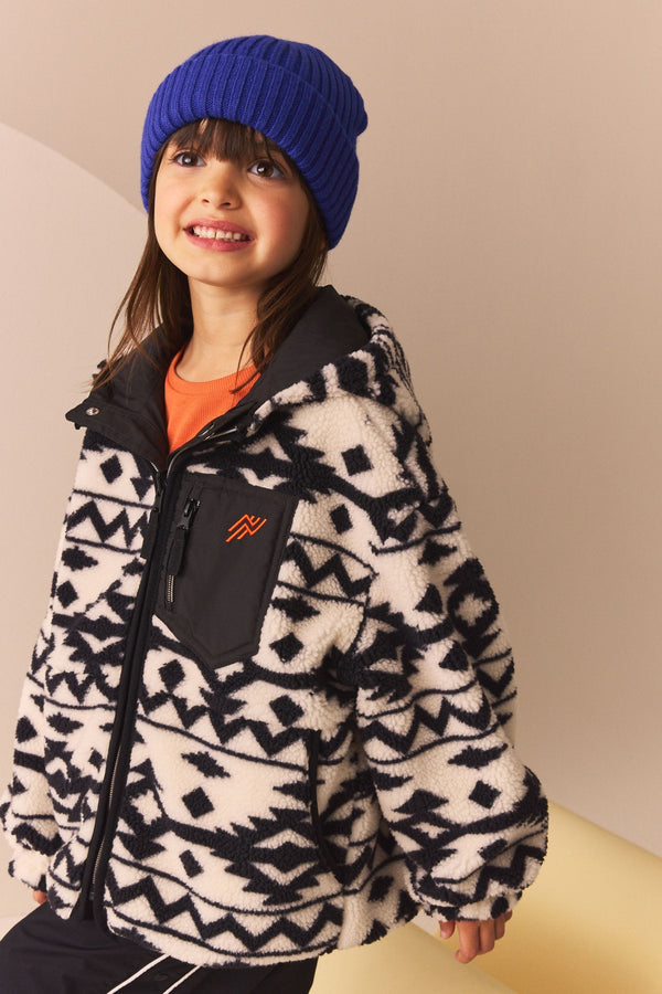 Black/White Reversible Aztec Printed Borg Fleece and Nylon Jacket (3-12yrs)