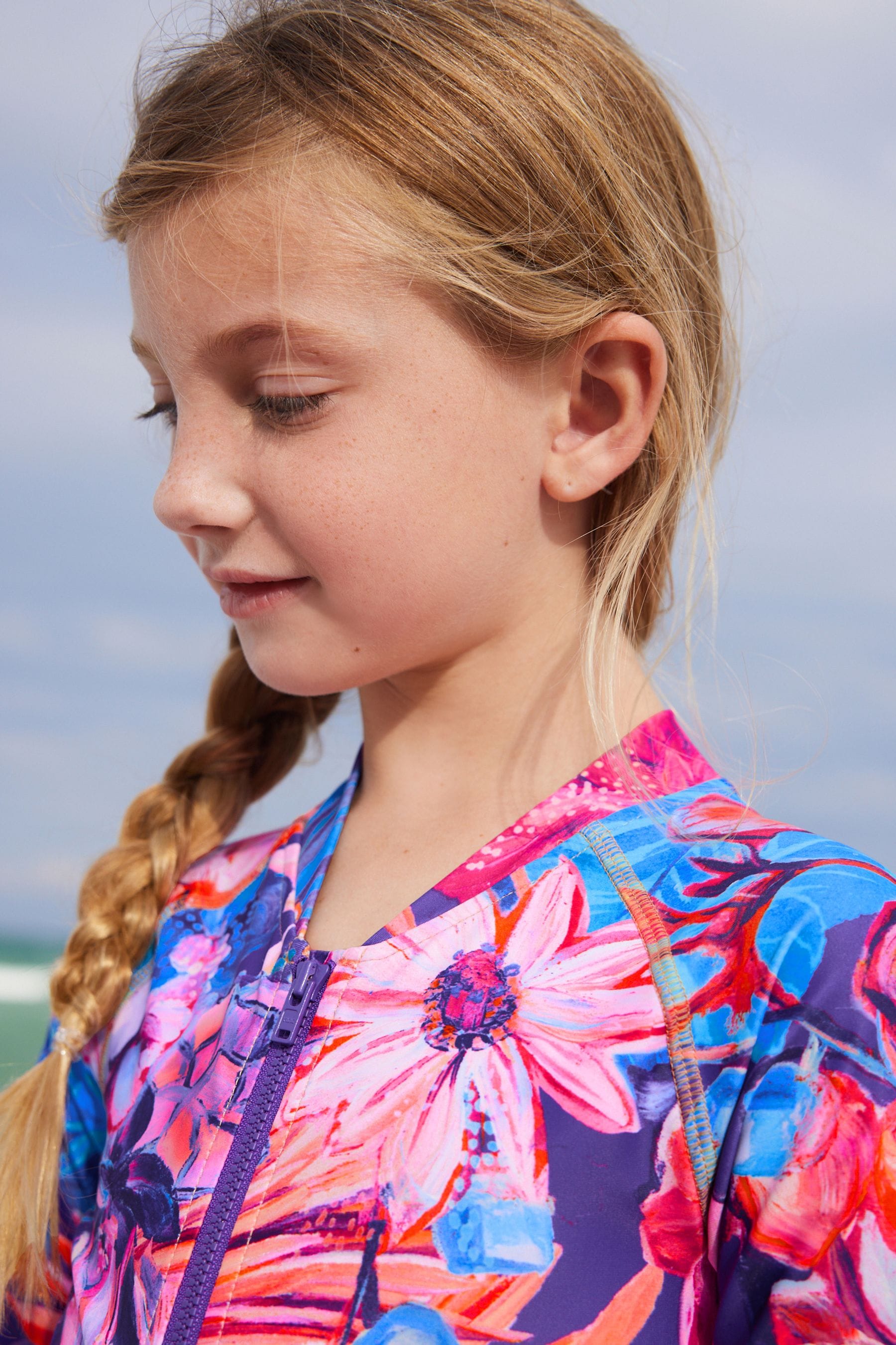 Purple Floral Long Sleeved Swimsuit (3-16yrs)