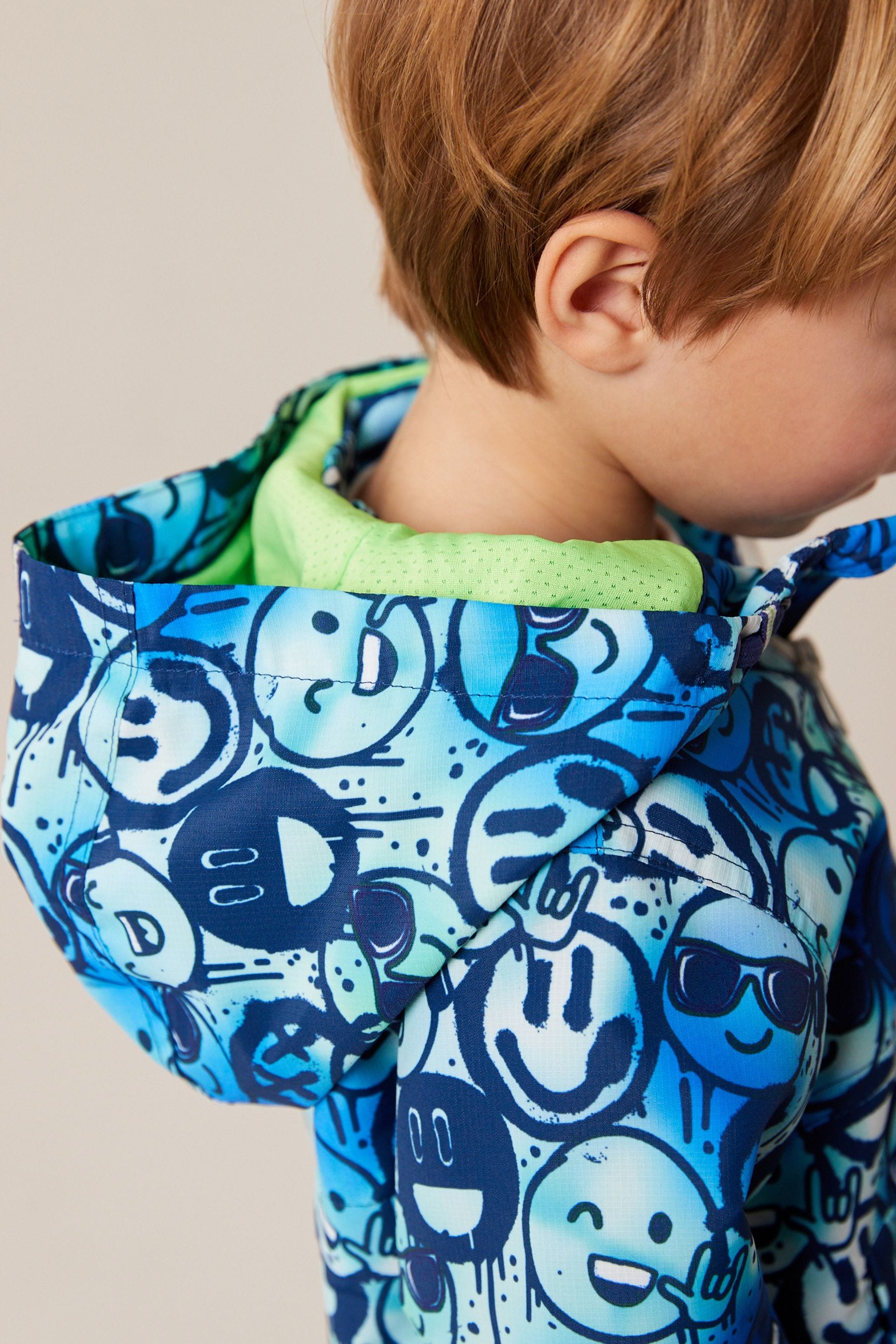 Blue Smile Face Shower Resistant Jacket (3mths-7yrs)