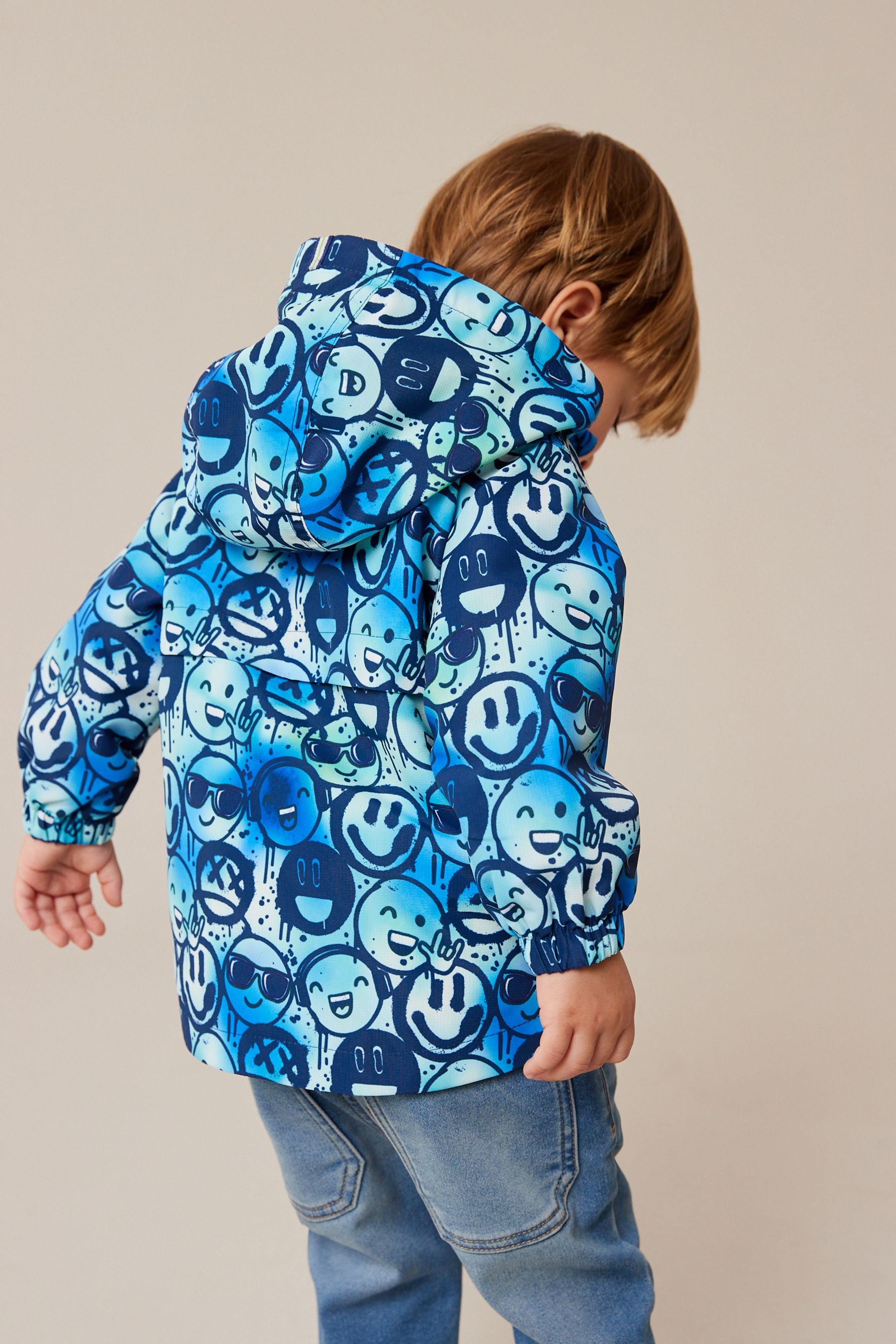 Blue Smile Face Shower Resistant Jacket (3mths-7yrs)