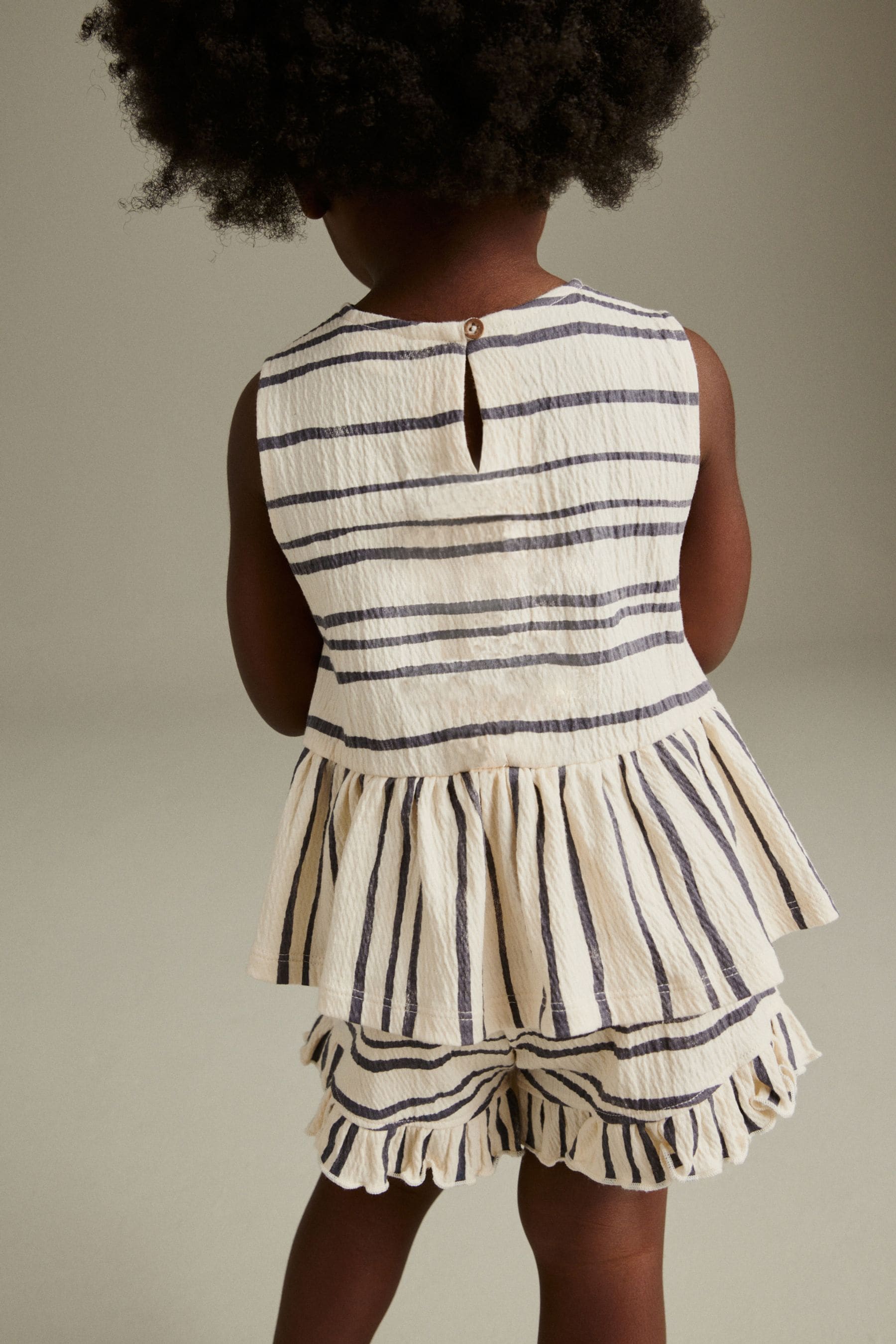 Black/White Textured Sleeveless Peplum Top and Shorts Set (3mths-7yrs)