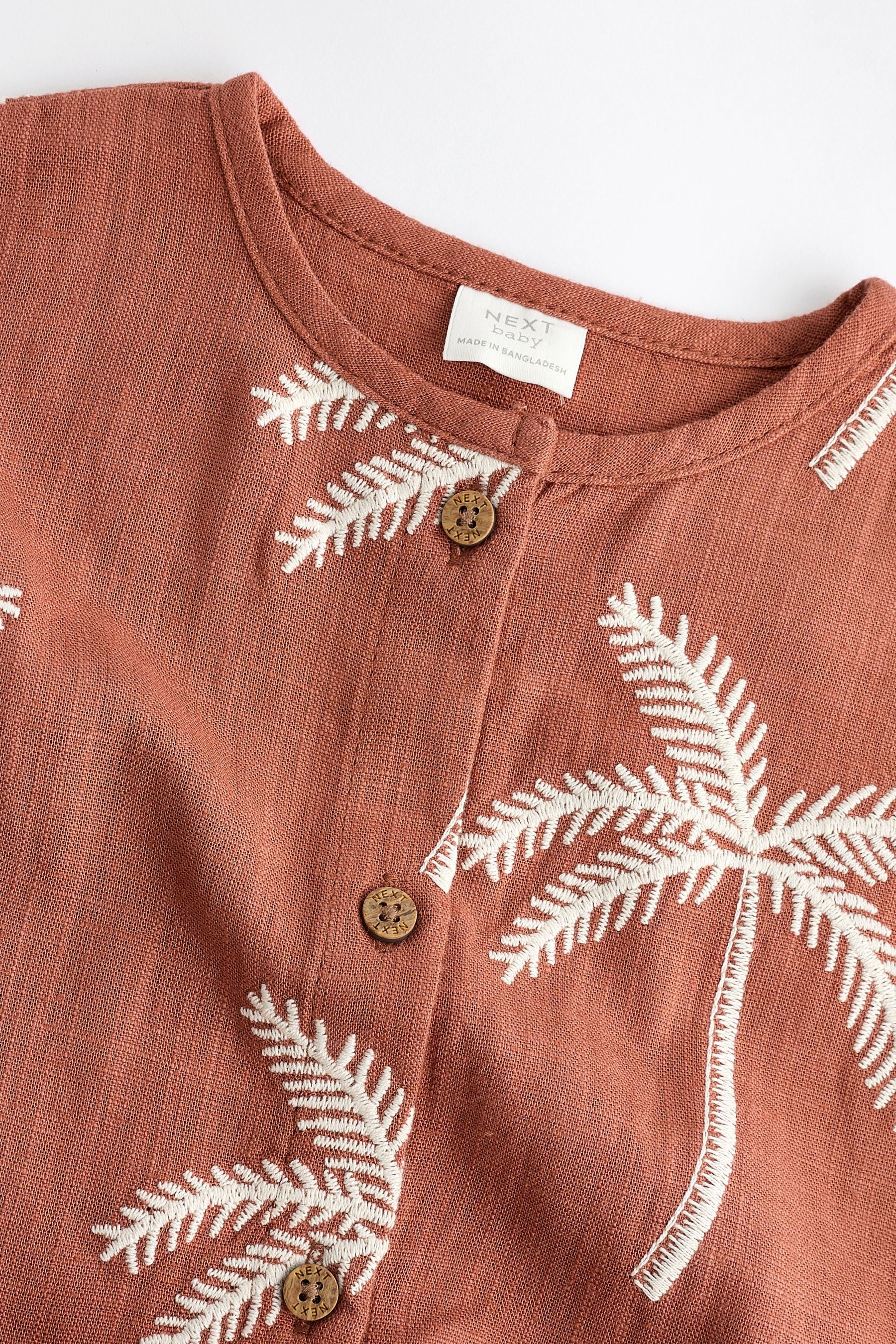 Rust Palm Tree Woven Baby Romper (0mths-2yrs)