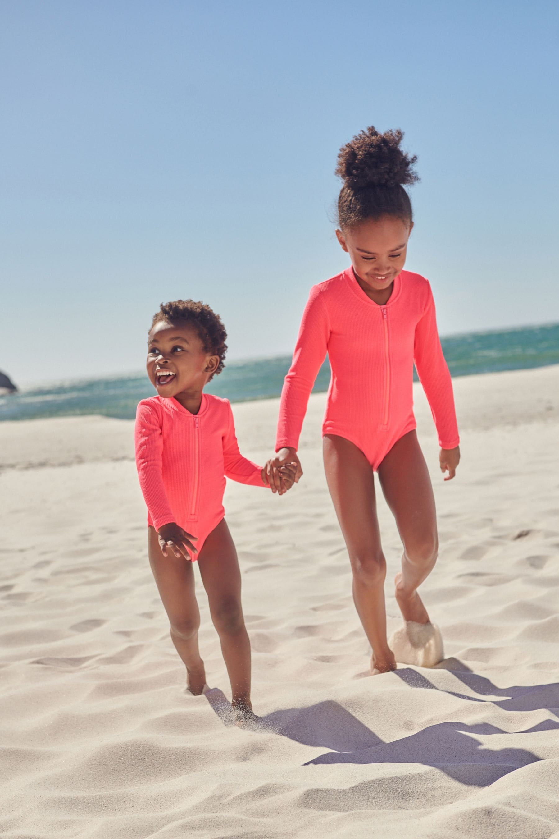 Fluro Pink Long Sleeve Textured Swimsuit (3mths-16yrs)