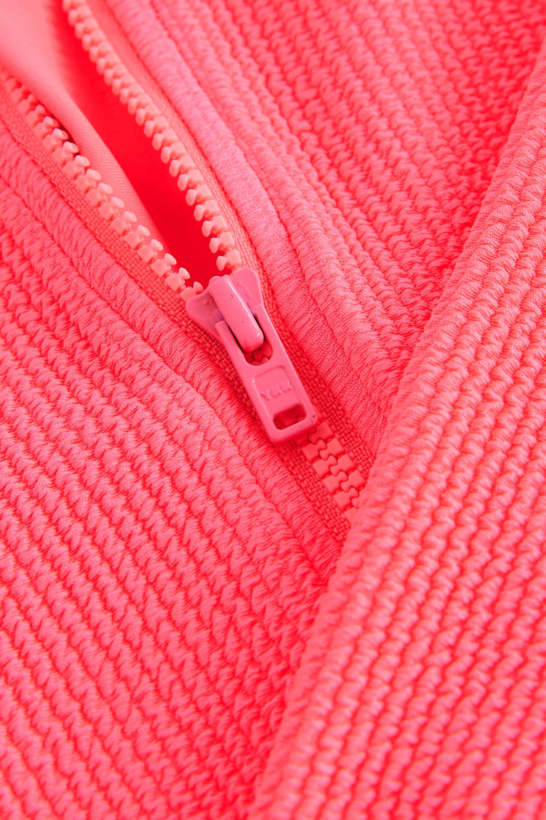 Fluro Pink Long Sleeve Textured Swimsuit (3mths-16yrs)