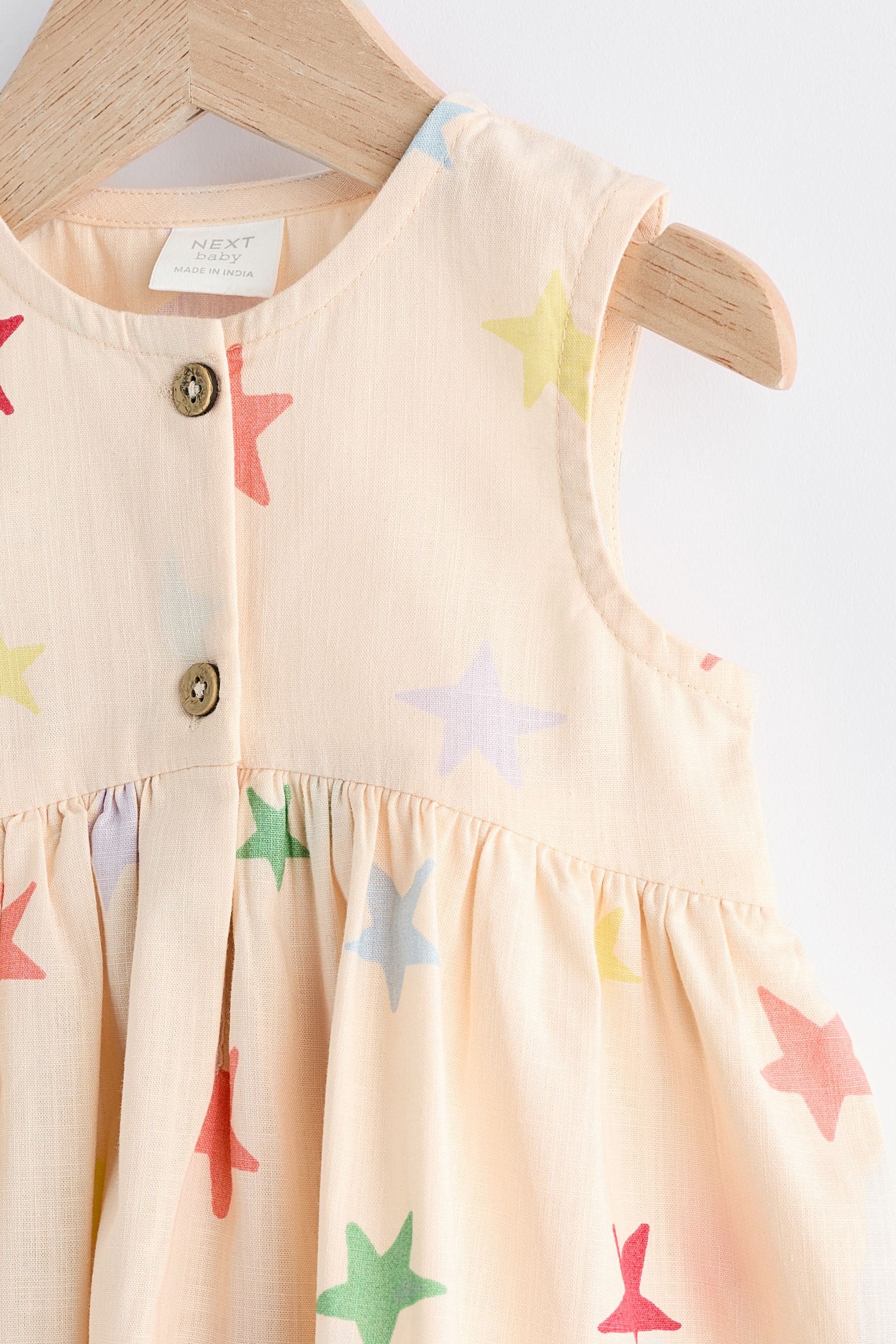 Cream/Multi Star Print Baby Integral Knickers Dress (0mths-2yrs)