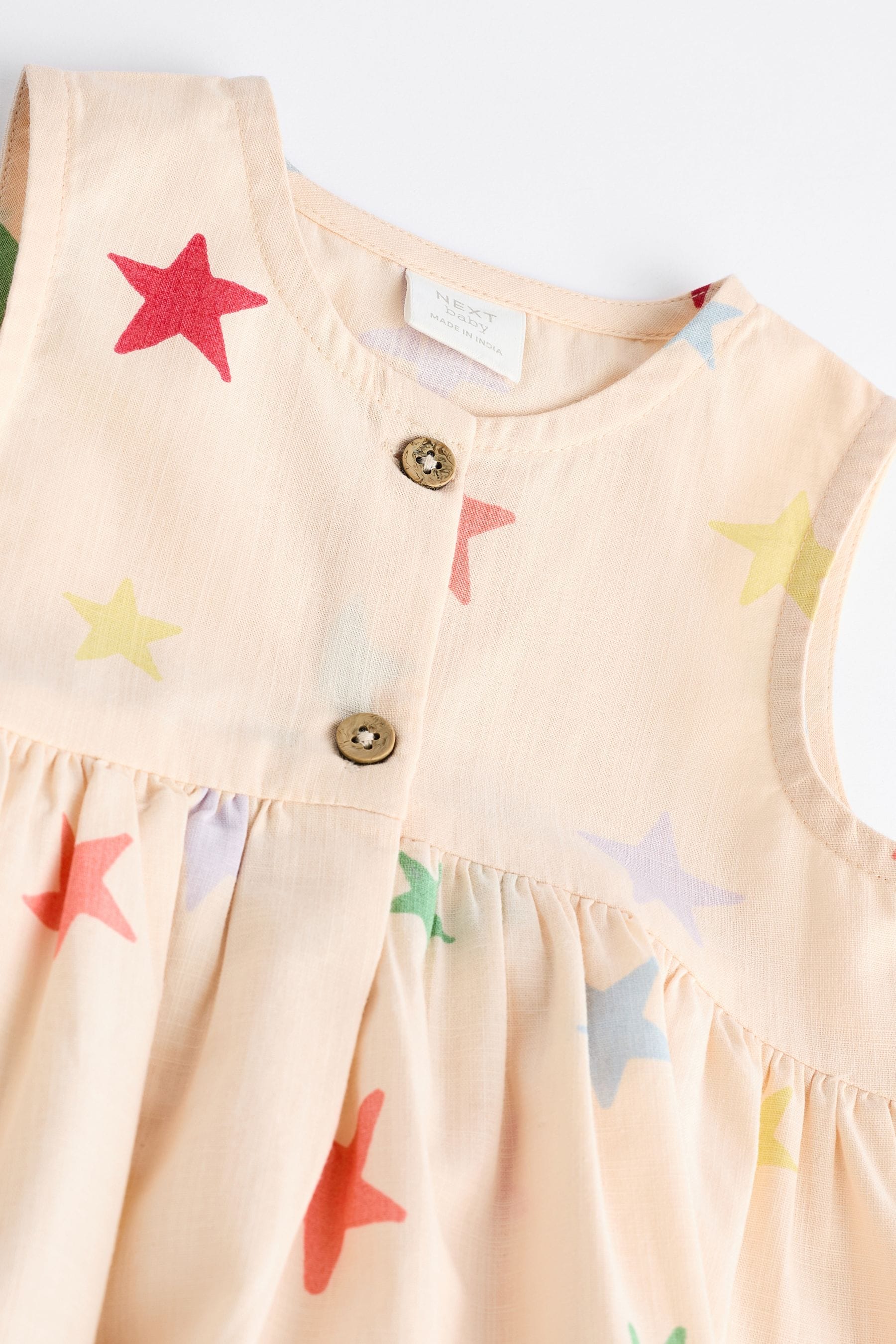 Cream/Multi Star Print Baby Integral Knickers Dress (0mths-2yrs)