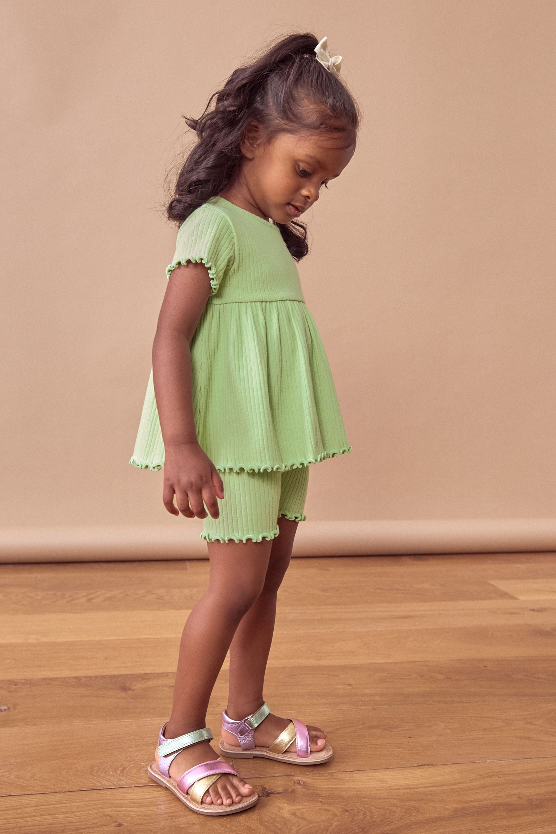 Green Ribbed Short Sleeve Peplum Top and Cycle Shorts Set (3mths-7yrs)