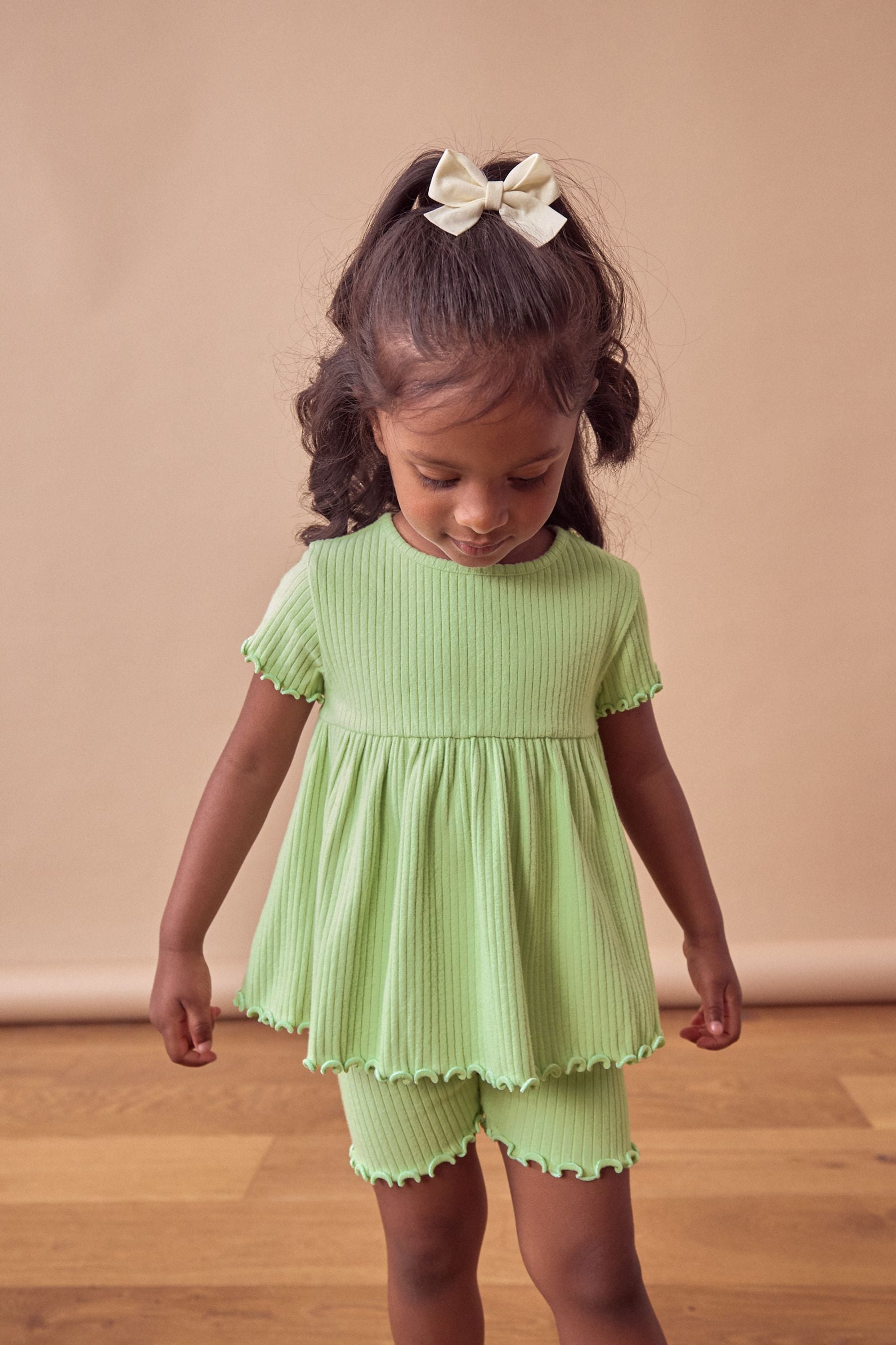 Green Ribbed Short Sleeve Peplum Top and Cycle Shorts Set (3mths-7yrs)