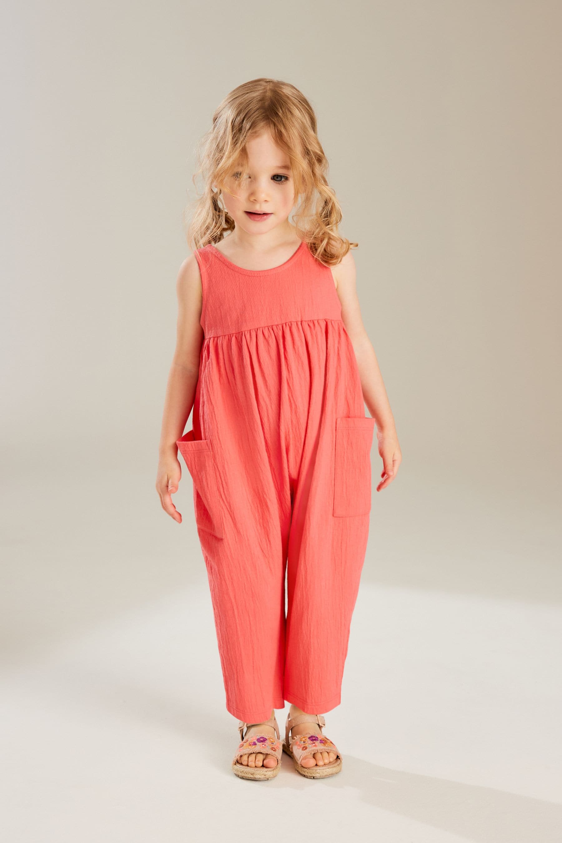 Coral Pink Sleeveless Jumpsuit (3mths-7yrs)