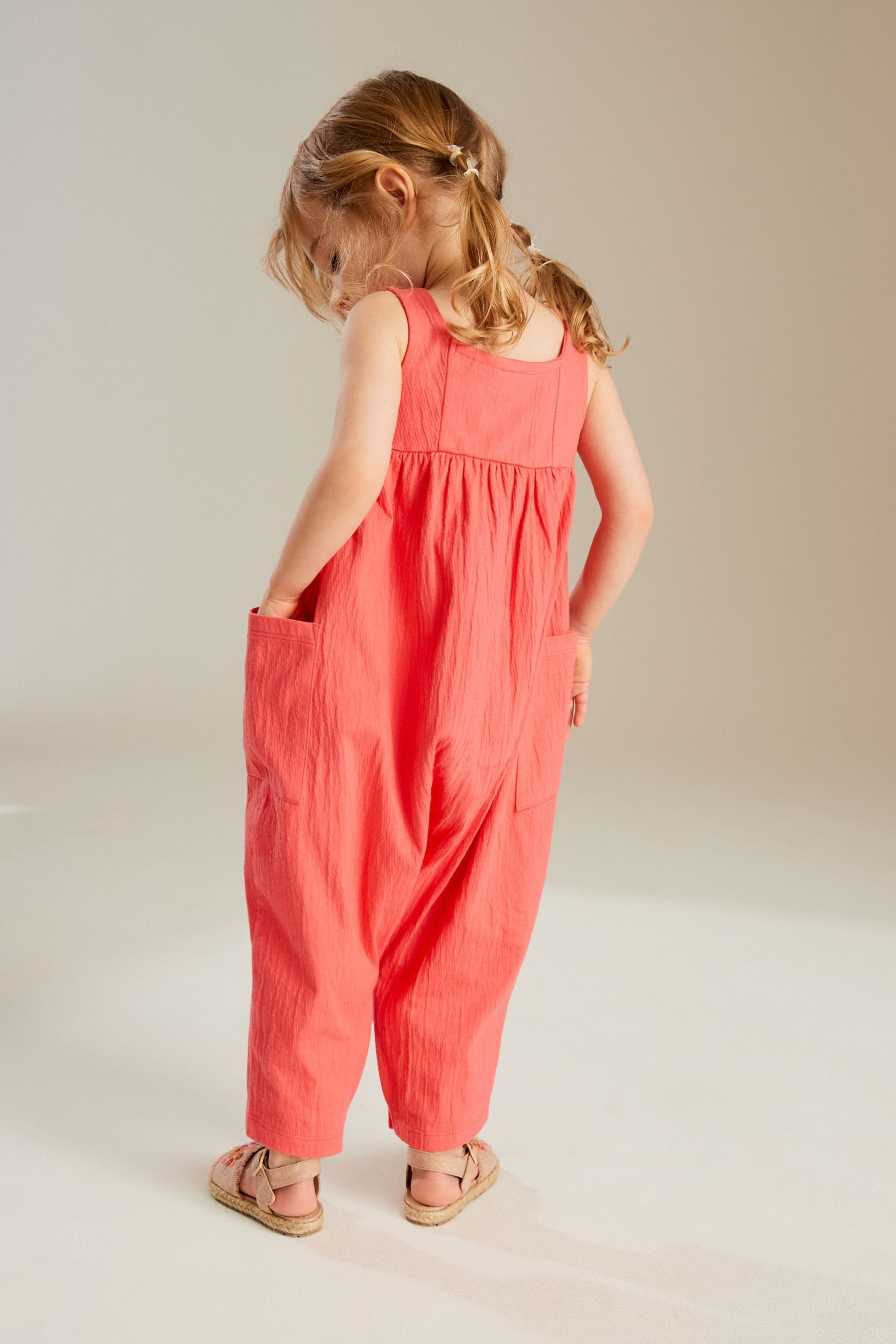 Coral Pink Sleeveless Jumpsuit (3mths-7yrs)