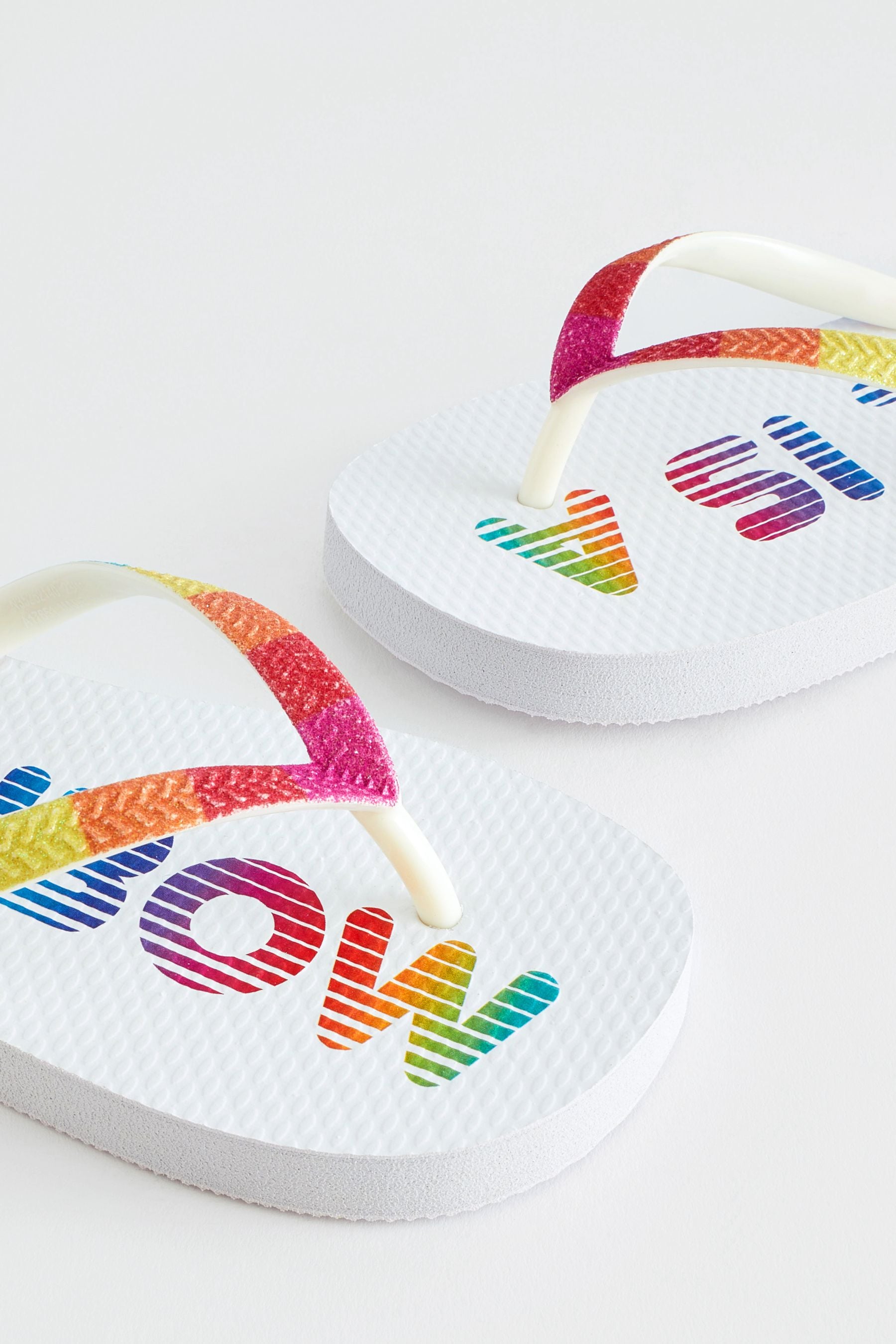 White Rainbow Flip Flops