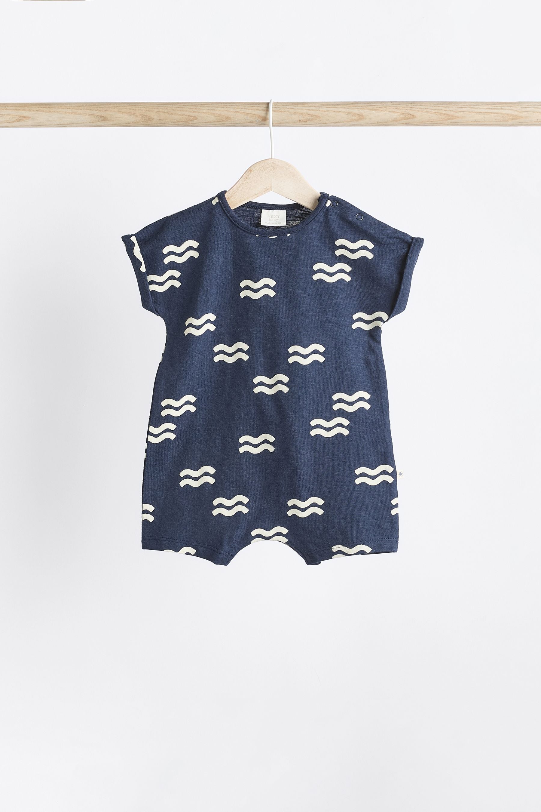 Navy Dinosaur Baby Jersey Rompers 4 Pack