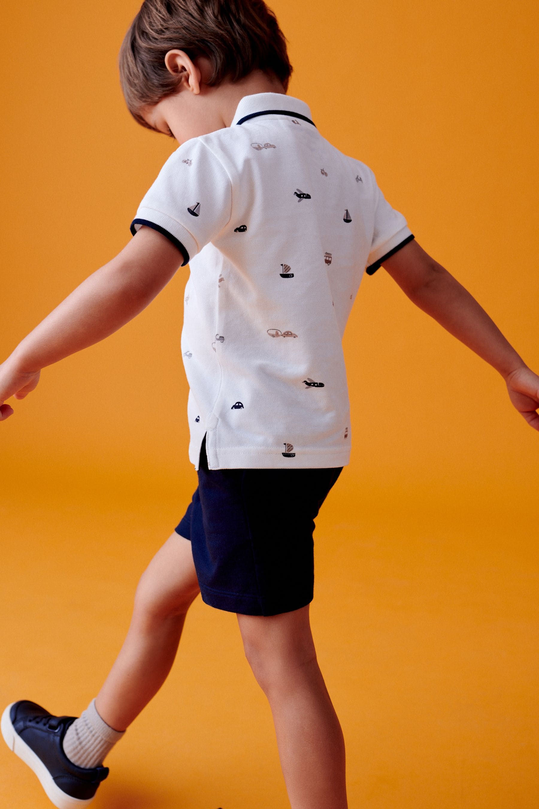 White 100% Cotton All Over Printed Polo Shirt And Shorts Set (3mths-7yrs)