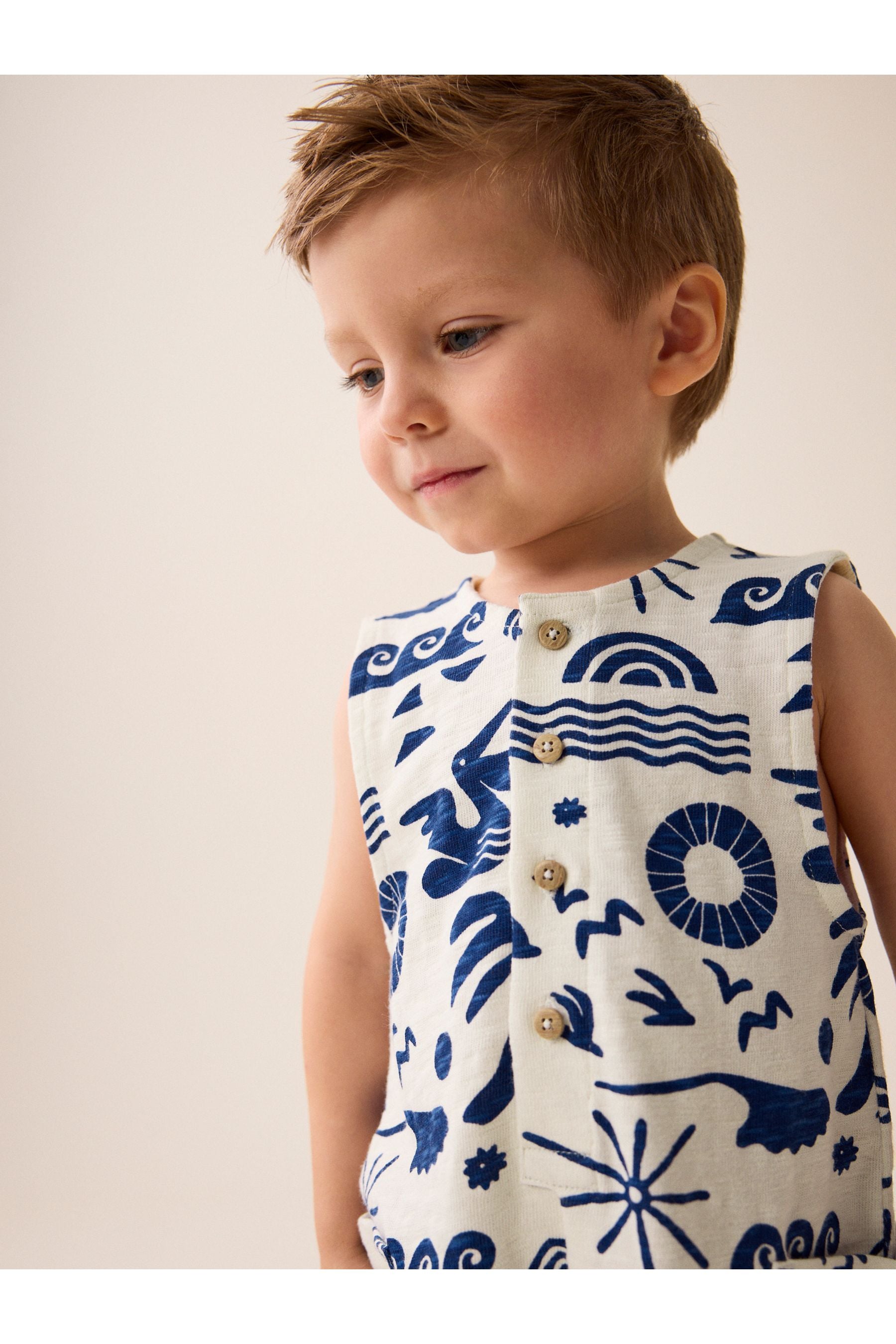 Cobalt Blue/Ecru All-Over Print All-In-One (3mths-7yrs)