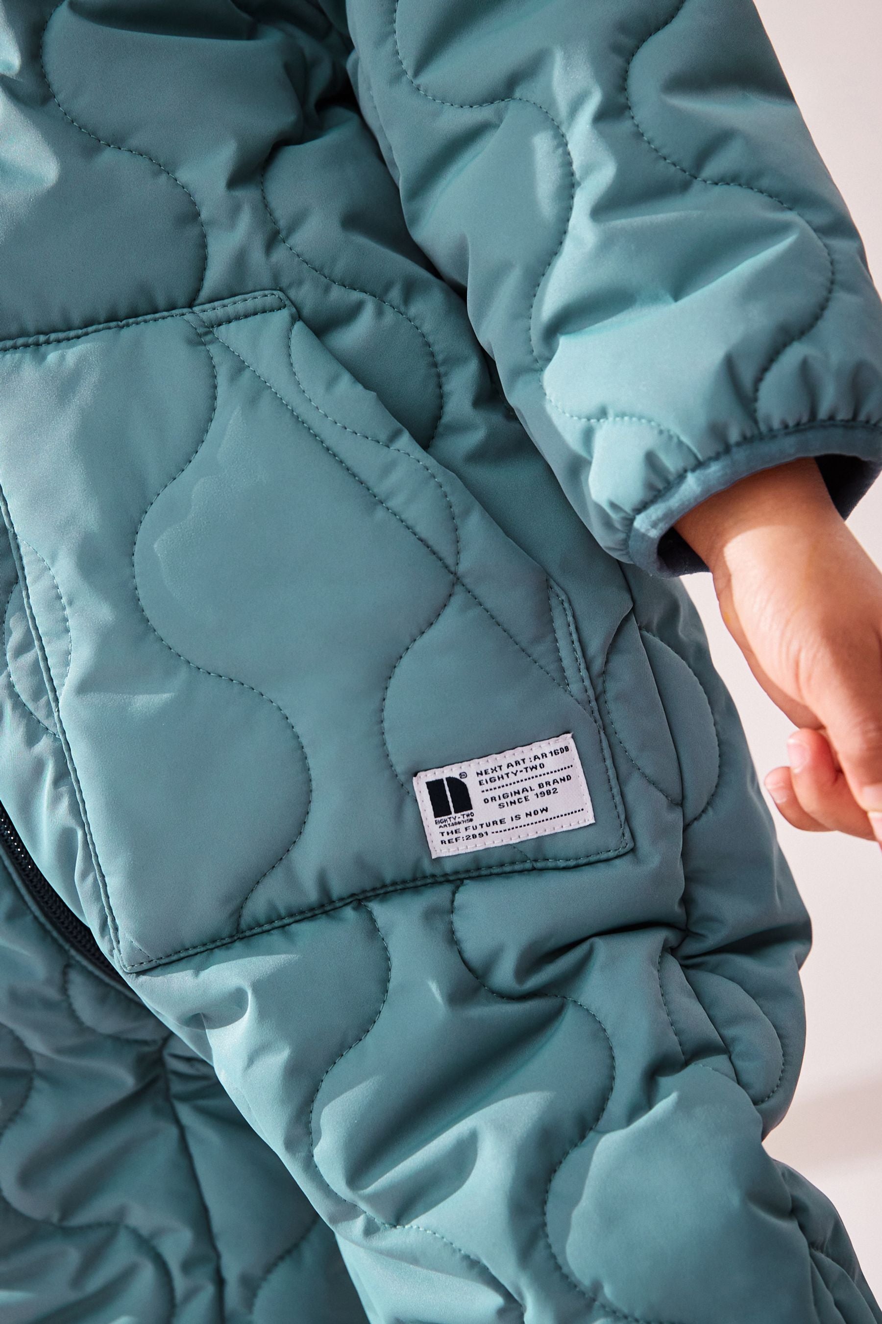 Light Blue Onion Quilt Plain Shower Resistant Snowsuit (3mths-7yrs)