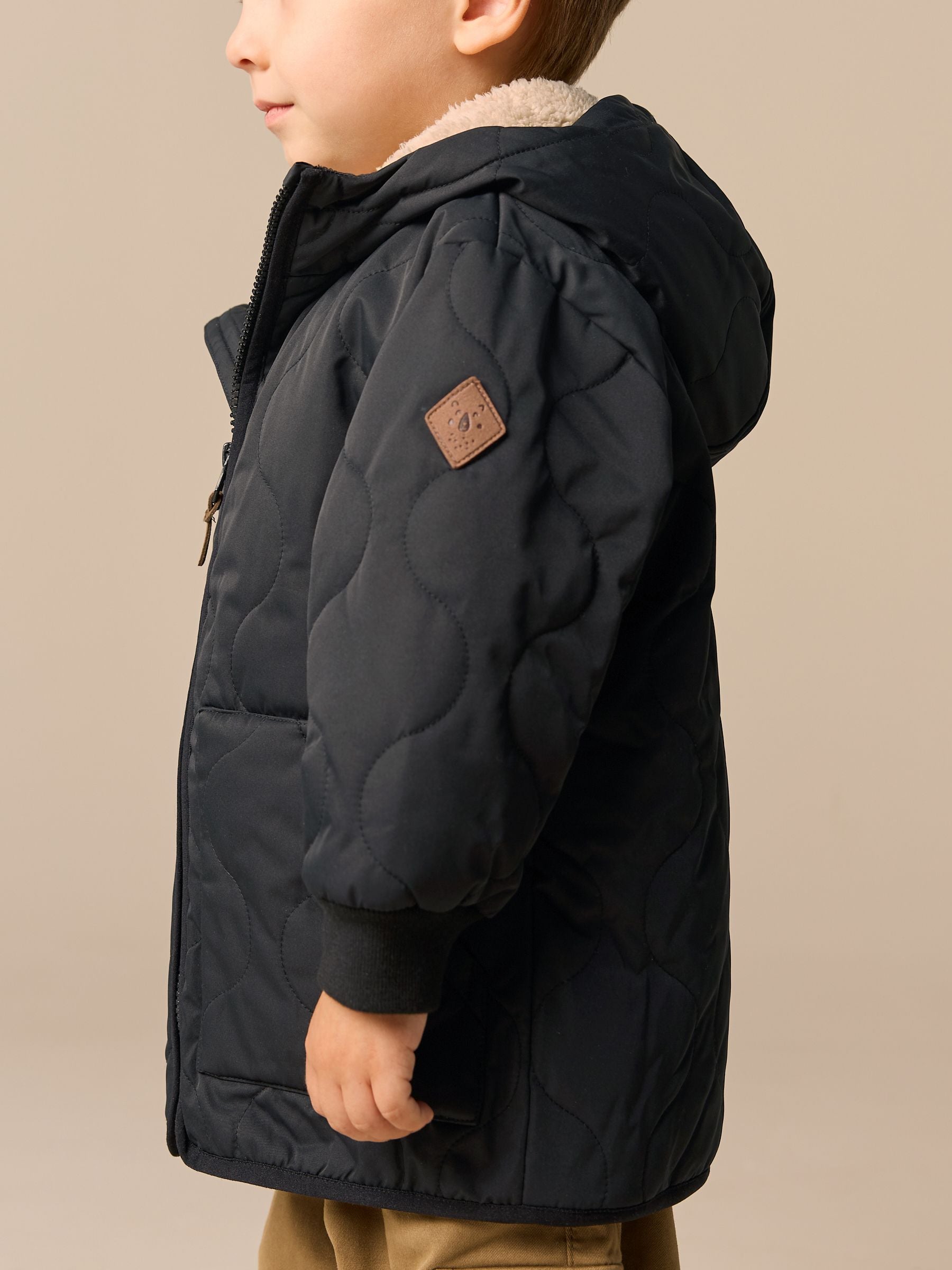 Black Quilted Borg Fleece Lined Shower Resistant Coat (3mths-7yrs)