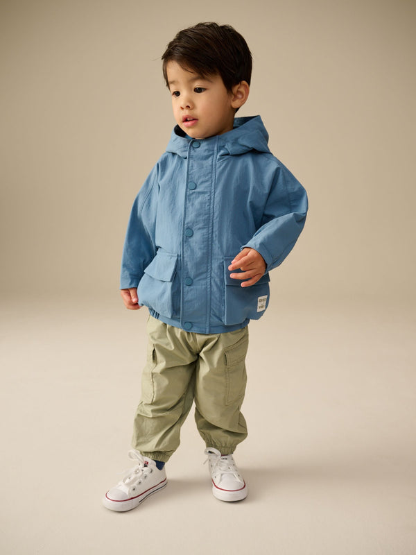 Light Blue Shower Resistant Anorak Jacket (3mths-7yrs)