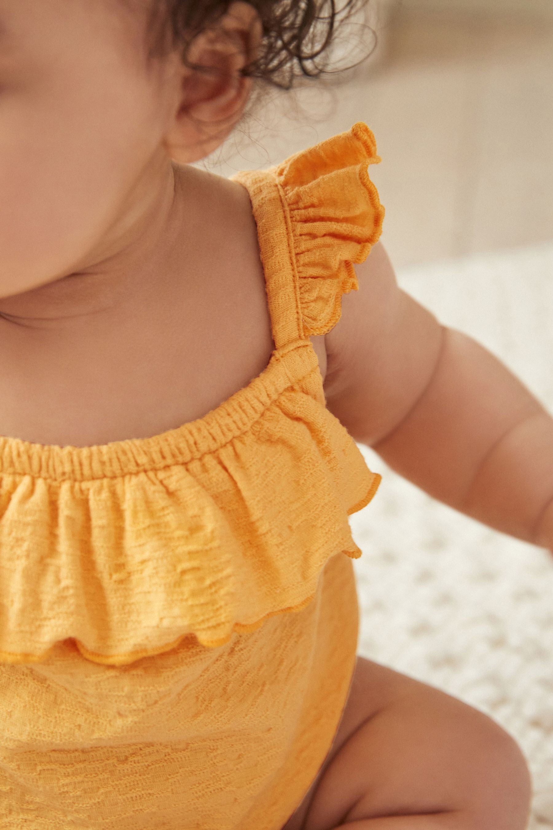 Yellow Textured Strappy Baby Romper