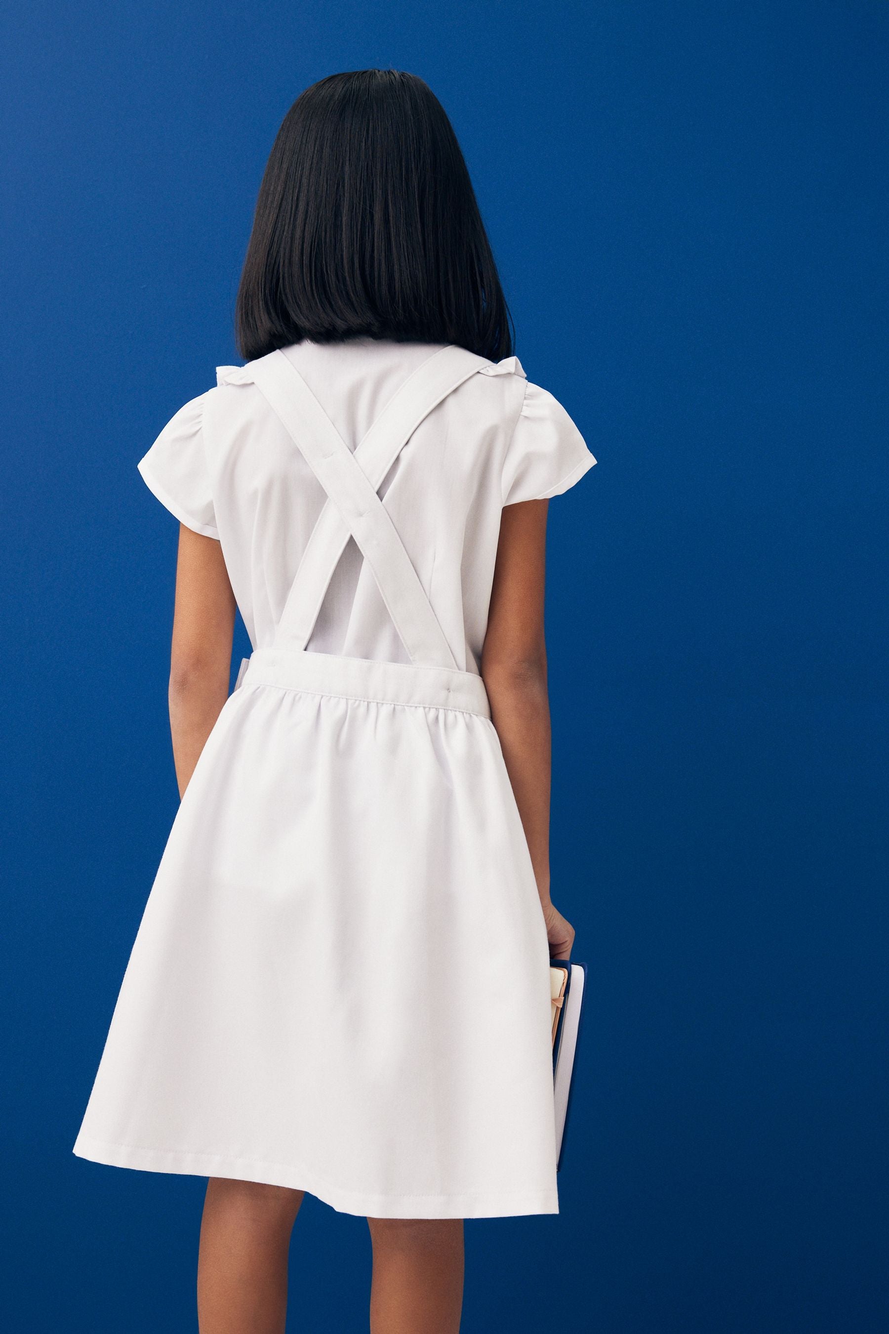 White Ruffle Detail Pinafore School Dress (3-14yrs)