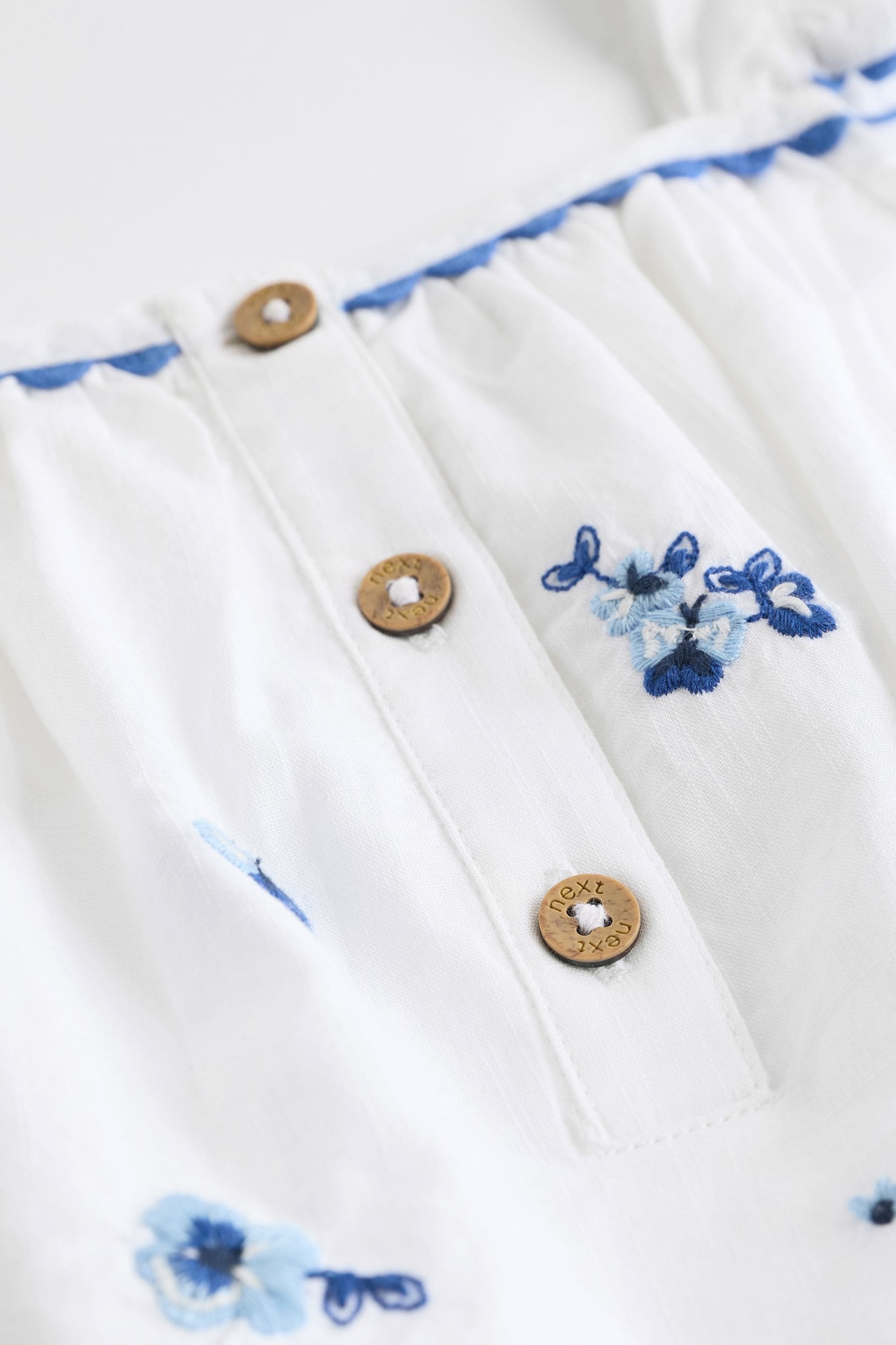 White/Blue Floral Embroidered Baby Woven Romper (0mths-2yrs)