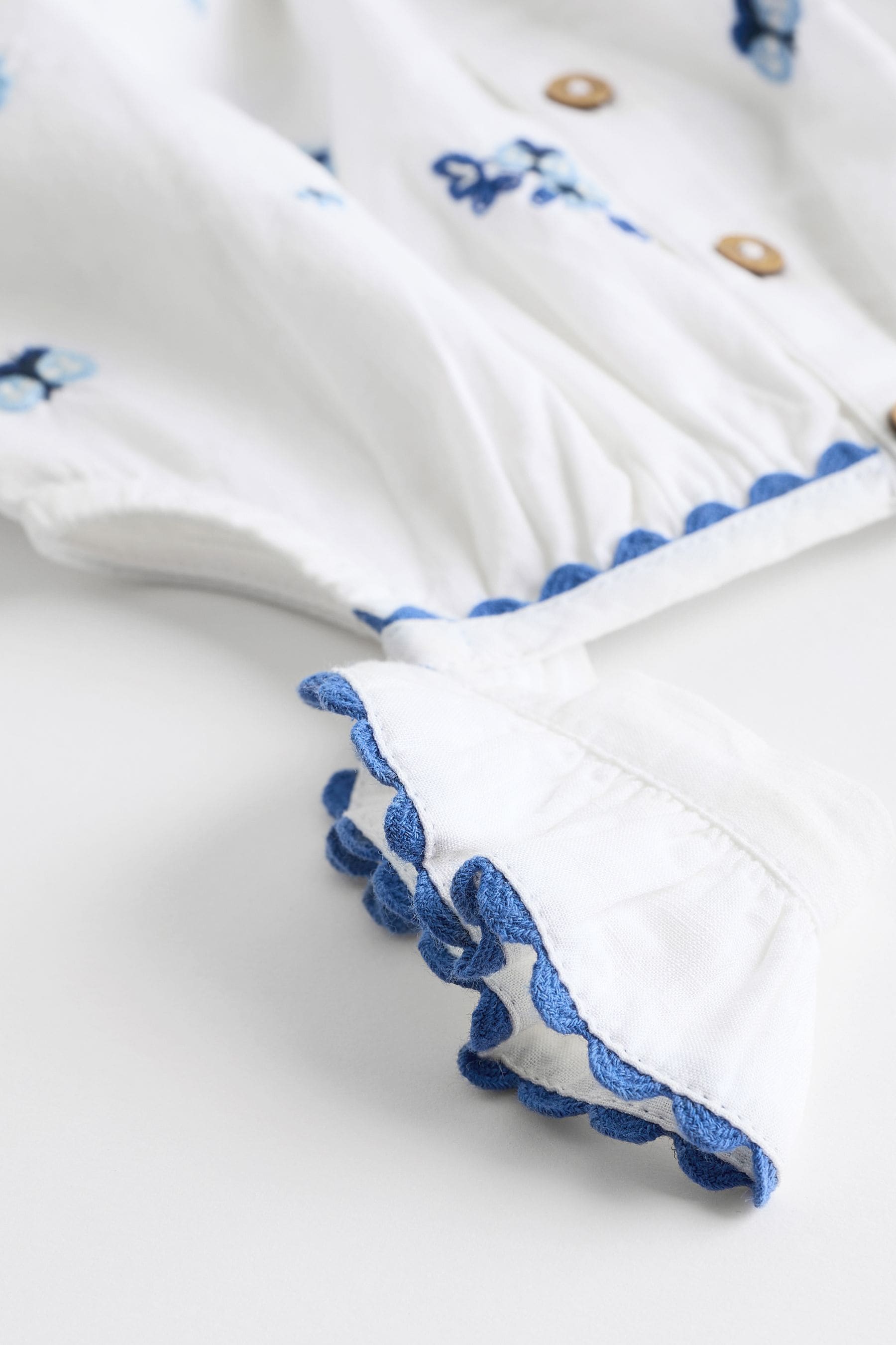 White/Blue Floral Embroidered Baby Woven Romper (0mths-2yrs)