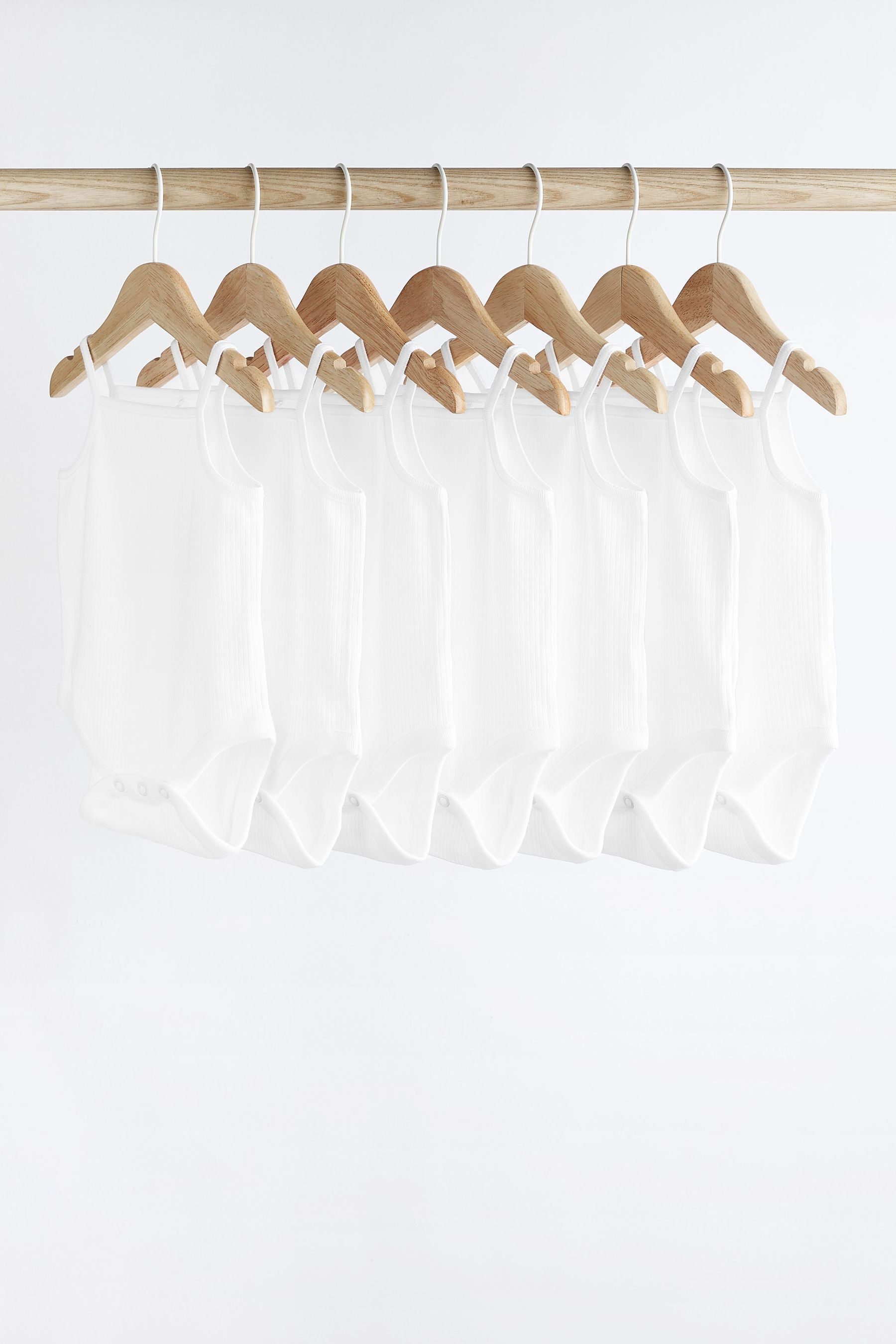 White 7 Pack Baby Strappy Bodysuits