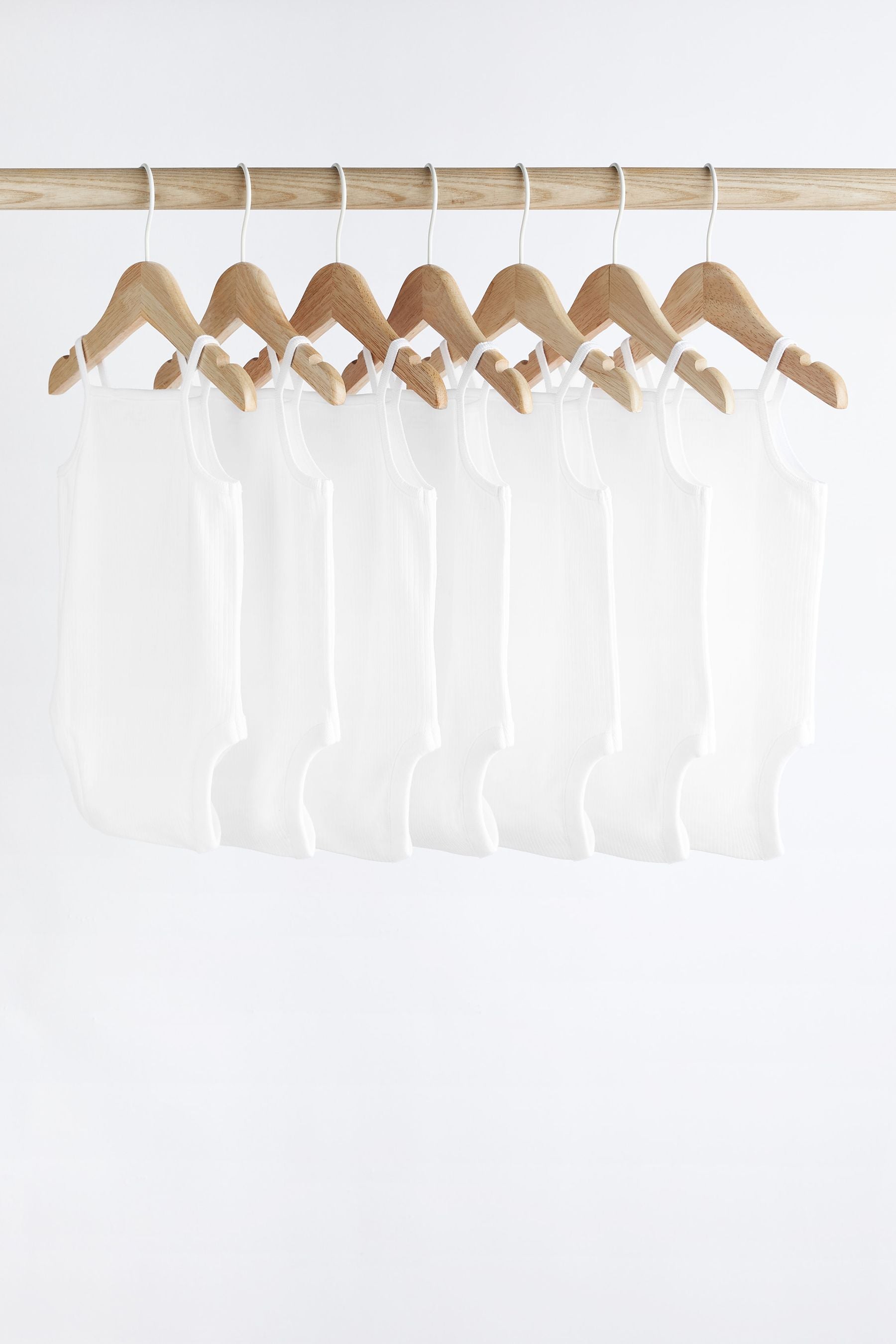 White 7 Pack Baby Strappy Bodysuits