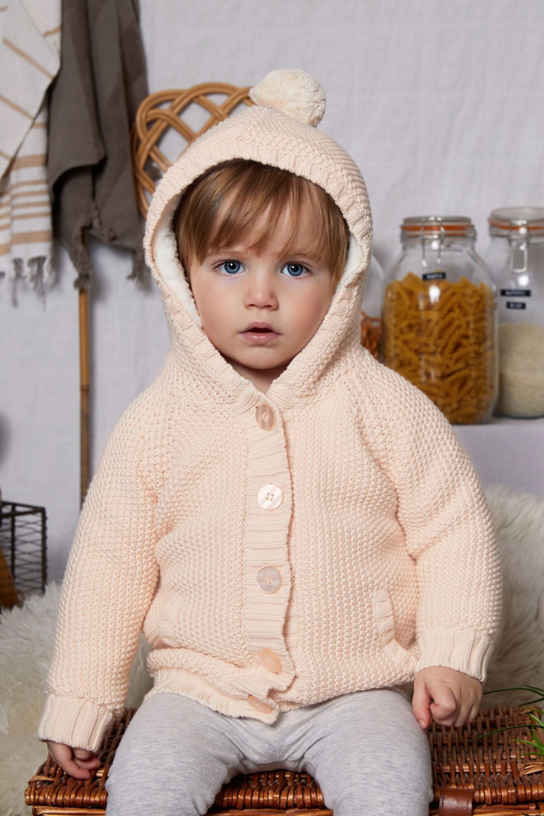 The Little Tailor Baby Pixie Pram Coat with Plush Lining and Pom Pom