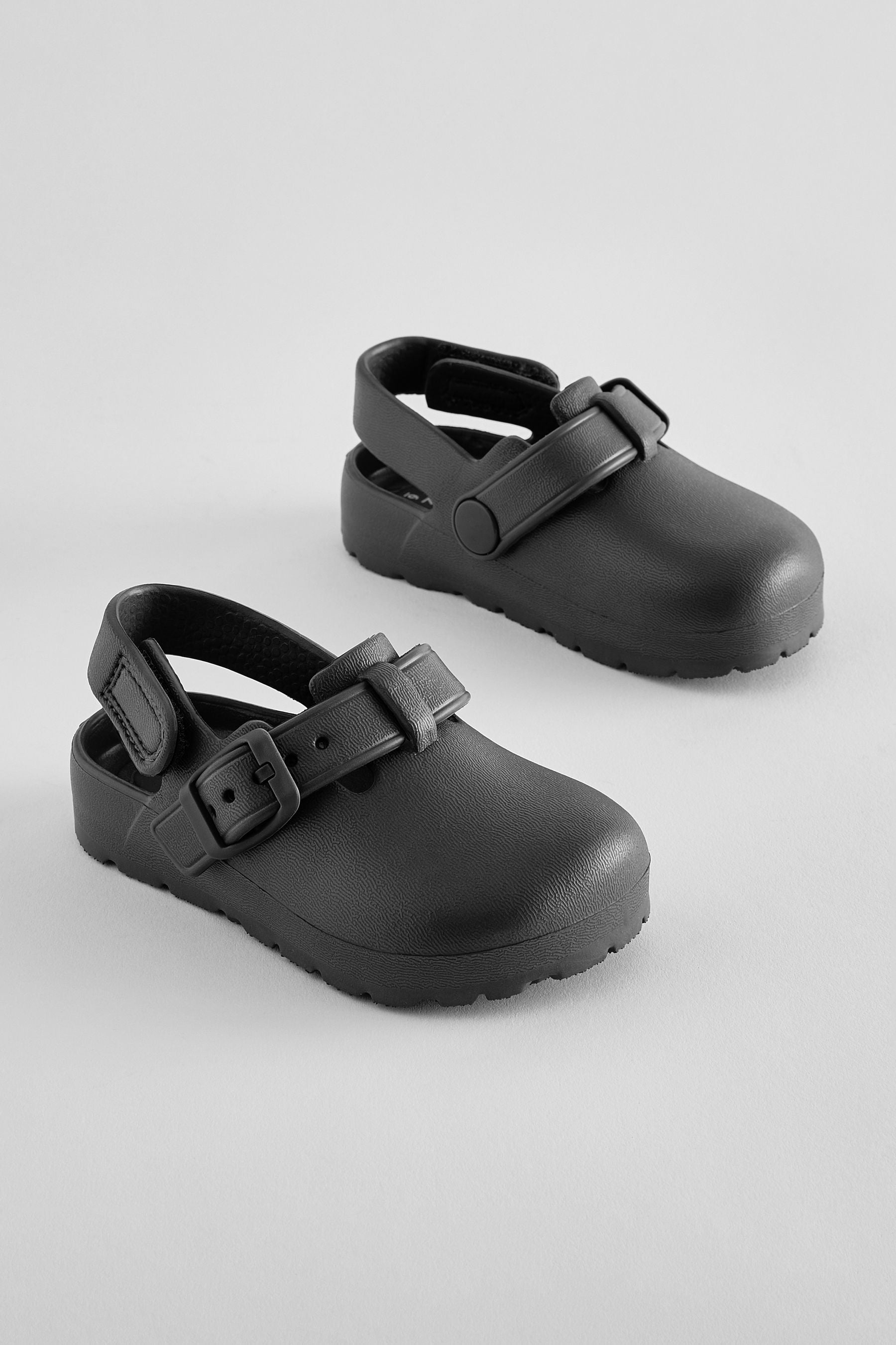 Black Buckle Clogs